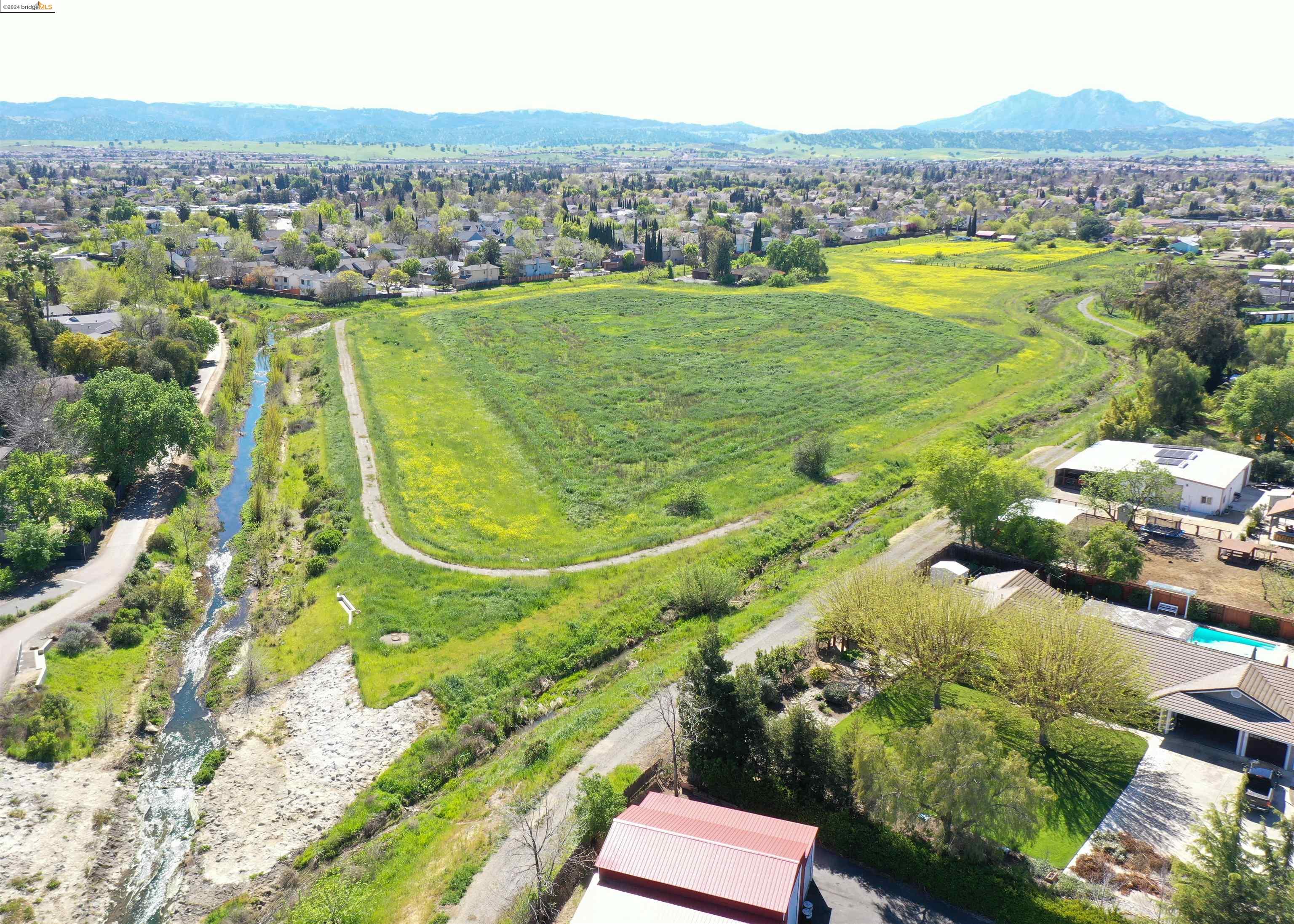 800 Minnesota Avenue Brentwood, CA 94513 - Photo 2 of 4 an aerial view of residential houses with outdoor space