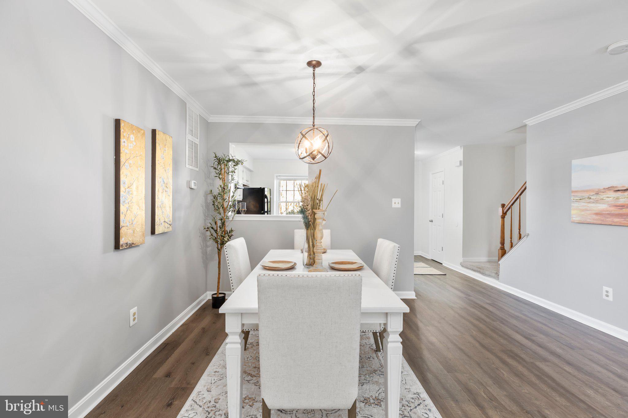 17929 Milroy Drive Dumfries, VA 22026 - Photo 11 of 36 a dining room with furniture and window