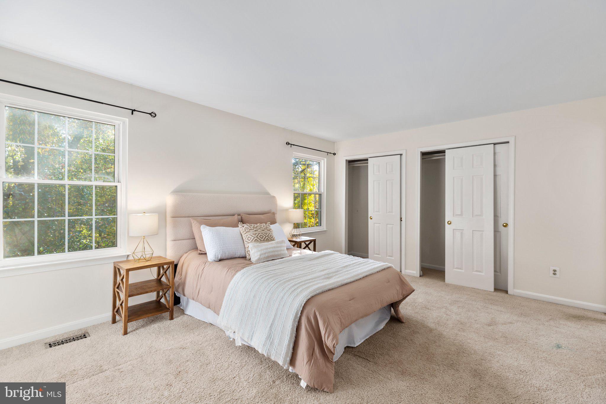 17929 Milroy Drive Dumfries, VA 22026 - Photo 12 of 36 a bedroom with a bed and a window