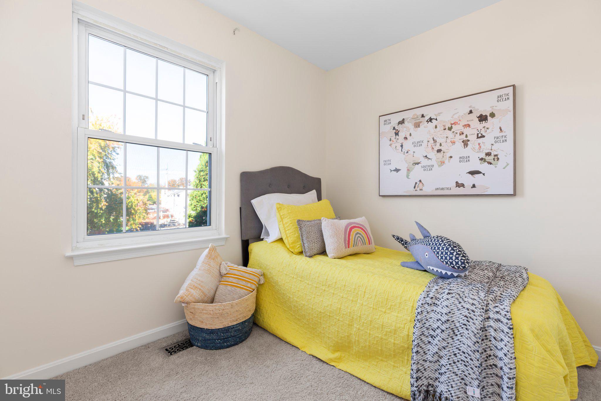 17929 Milroy Drive Dumfries, VA 22026 - Photo 19 of 36 a bedroom with a bed and a painting on the wall