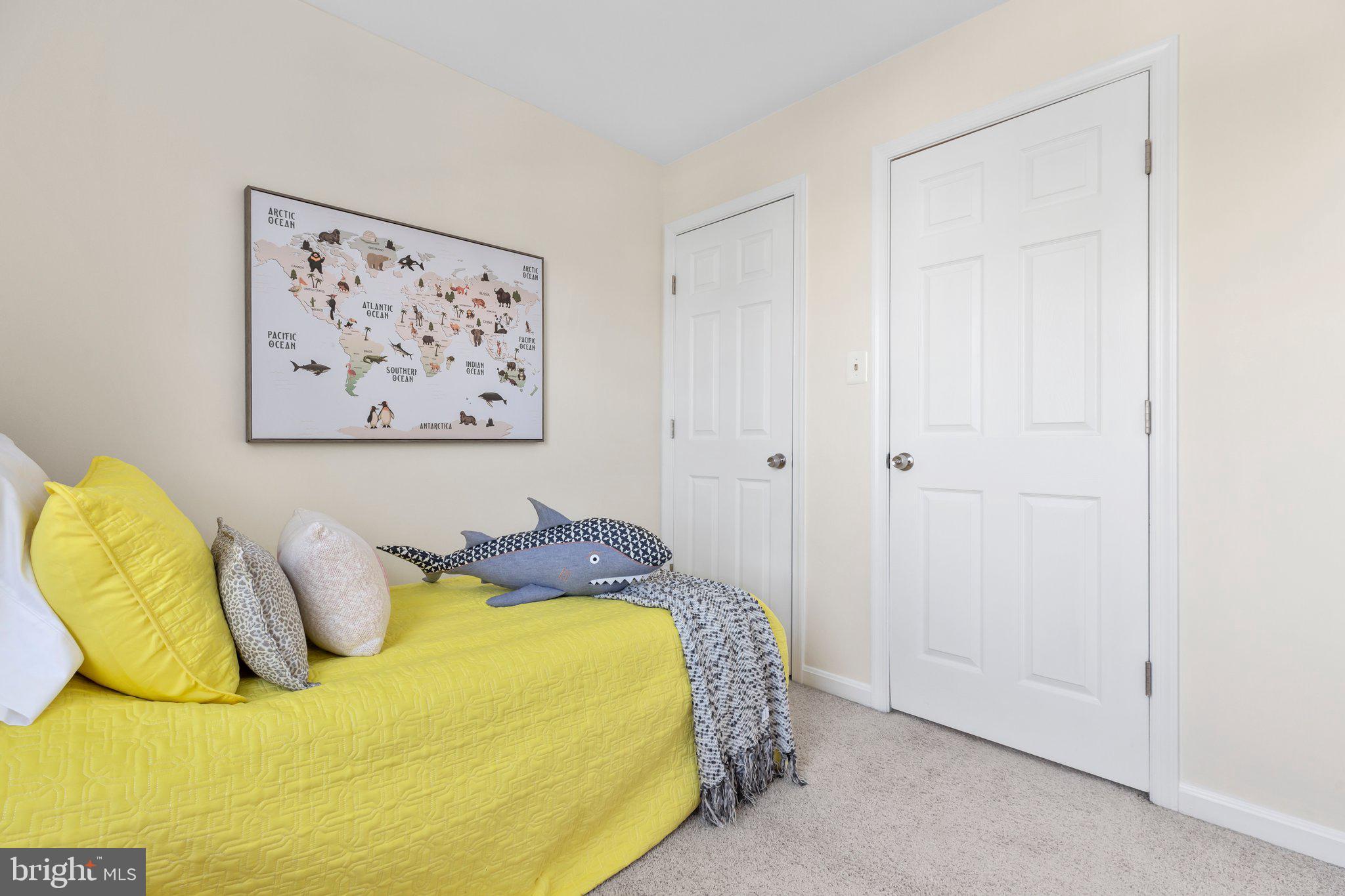 17929 Milroy Drive Dumfries, VA 22026 - Photo 20 of 36 a bedroom with a bed and painting on the wall