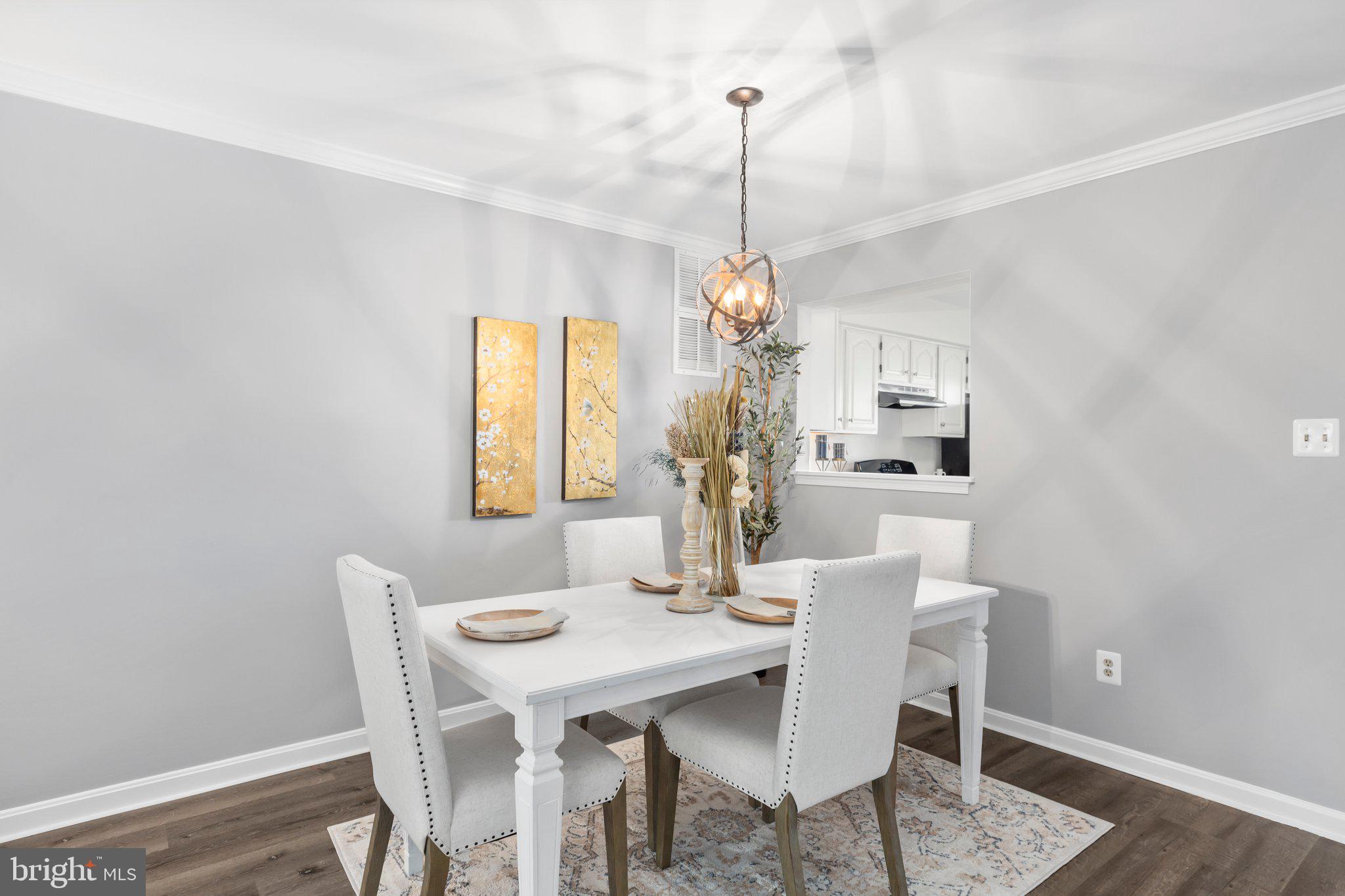 17929 Milroy Drive Dumfries, VA 22026 - Photo 2 of 36 a view of a dining room with furniture window and wooden floor