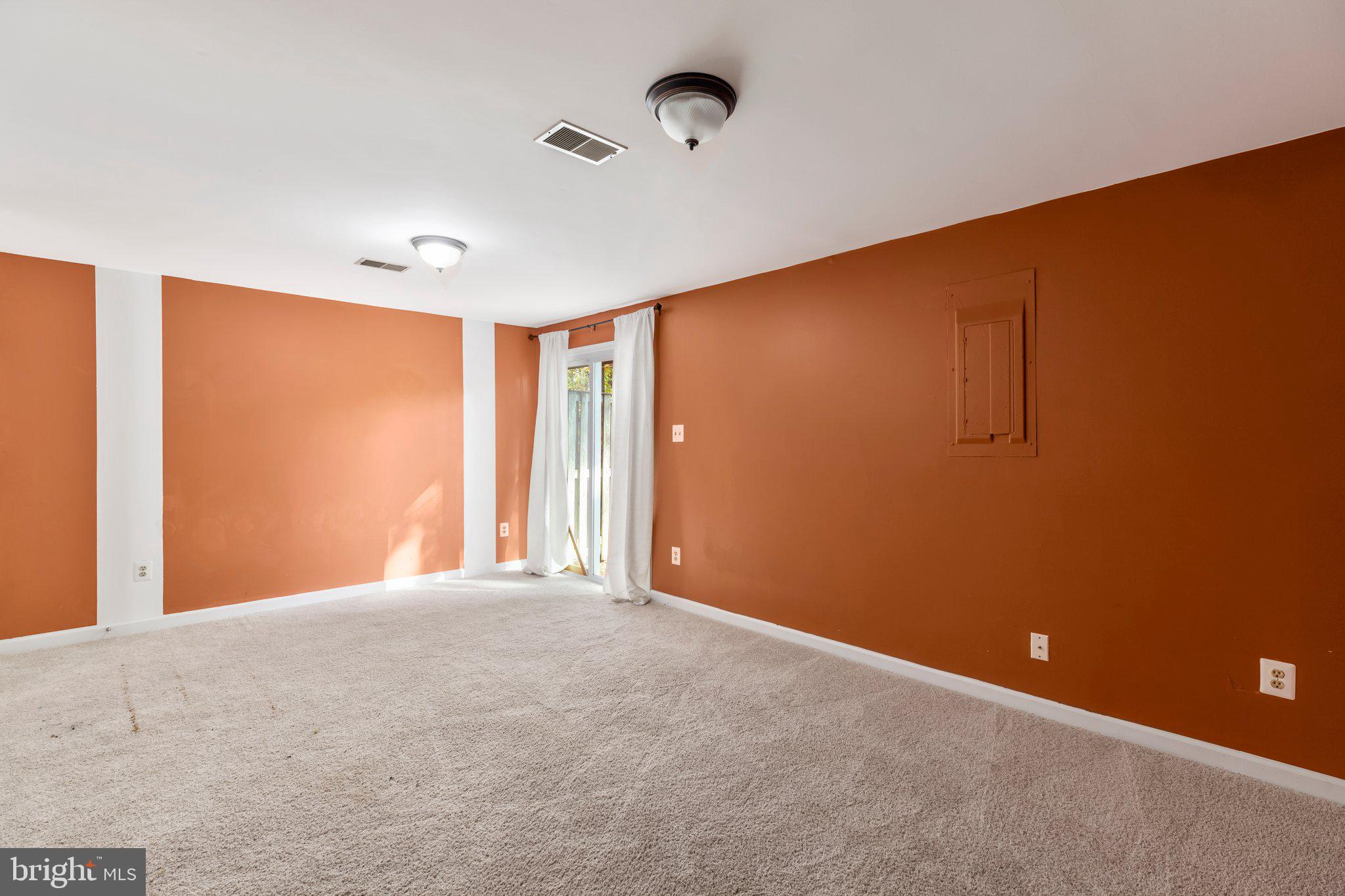 17929 Milroy Drive Dumfries, VA 22026 - Photo 24 of 36 a view of an empty room with a window
