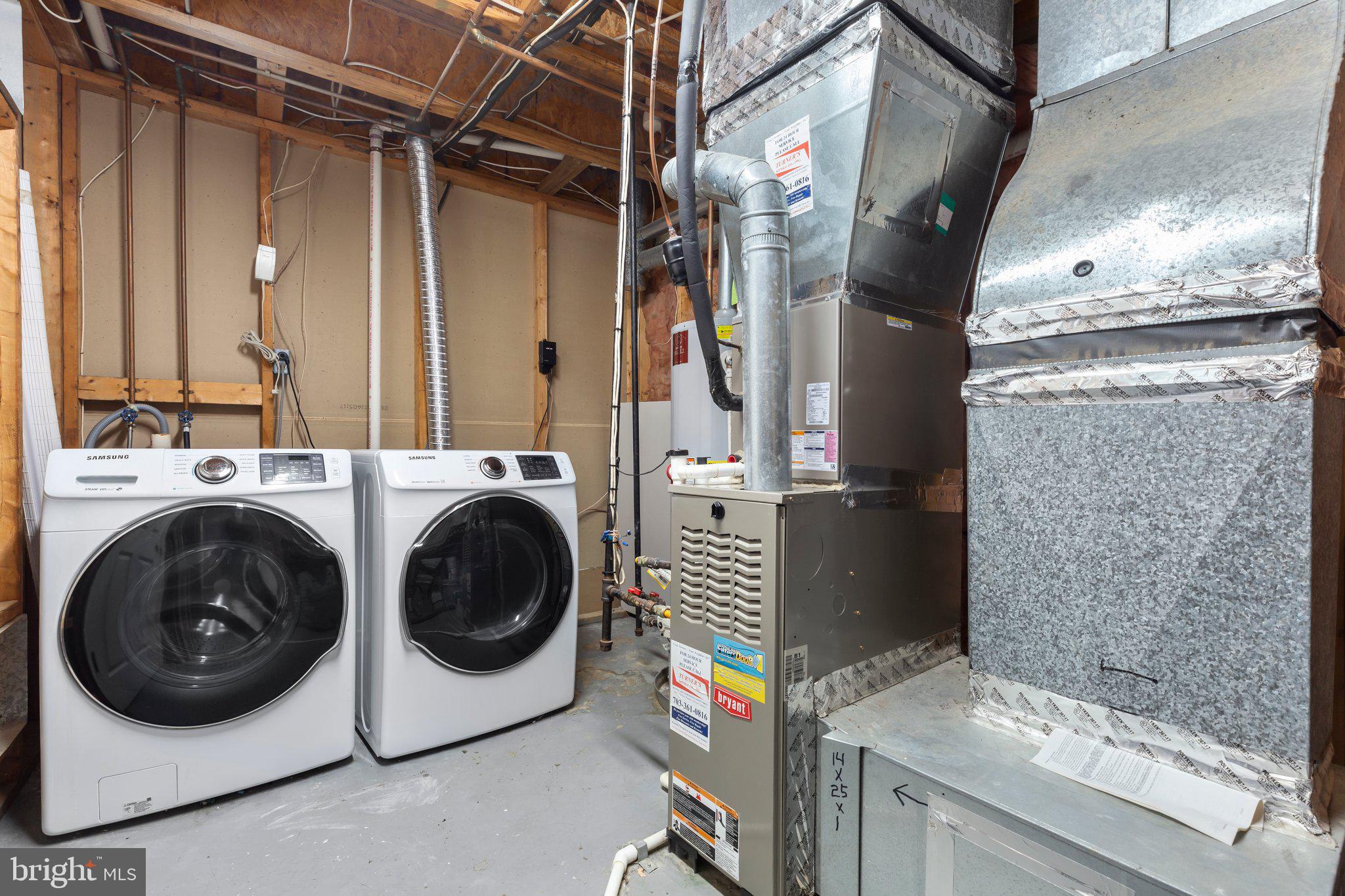17929 Milroy Drive Dumfries, VA 22026 - Photo 27 of 36 a utility room with dryer and washer