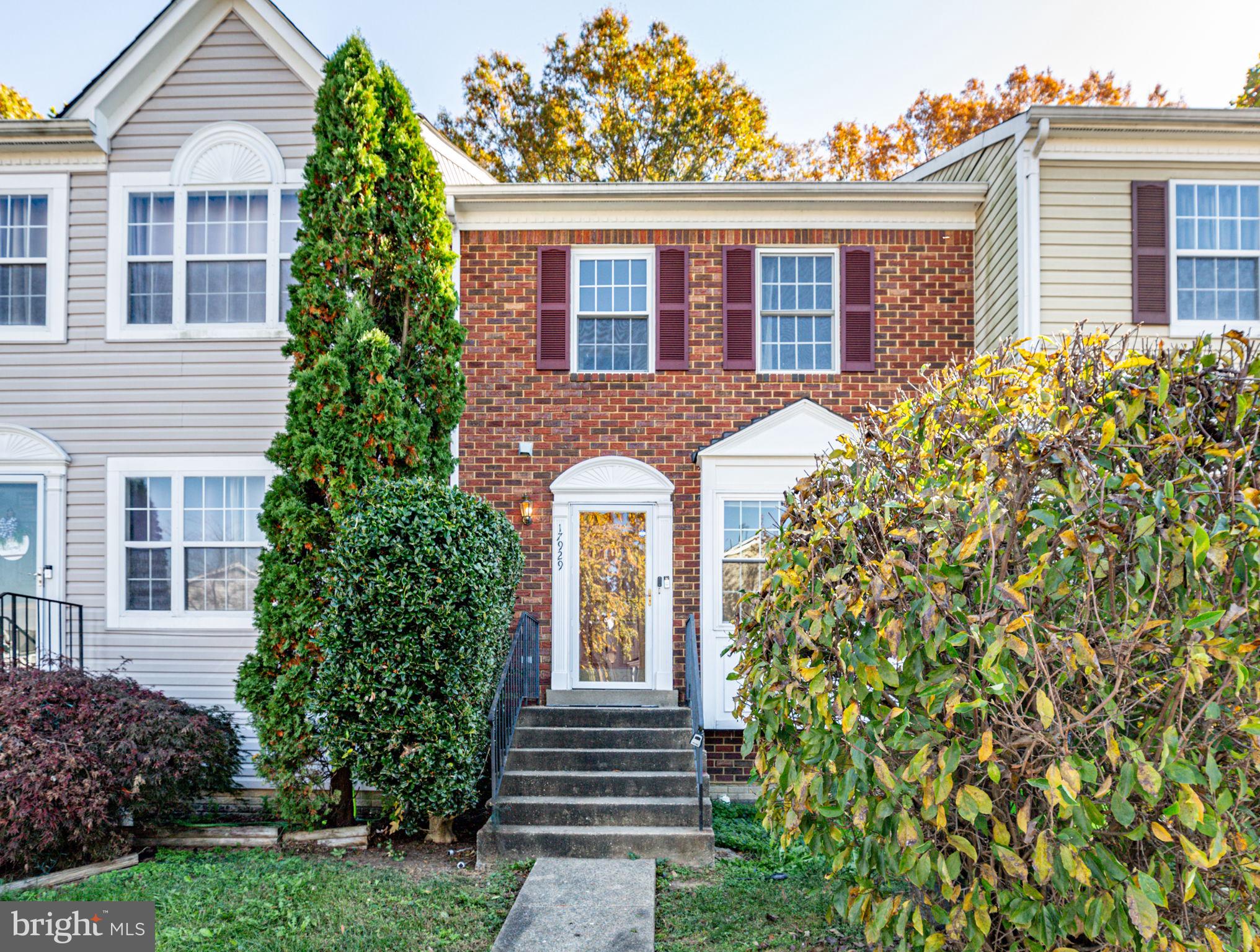 17929 Milroy Drive Dumfries, VA 22026 - Photo 28 of 36 a front view of a house with garden