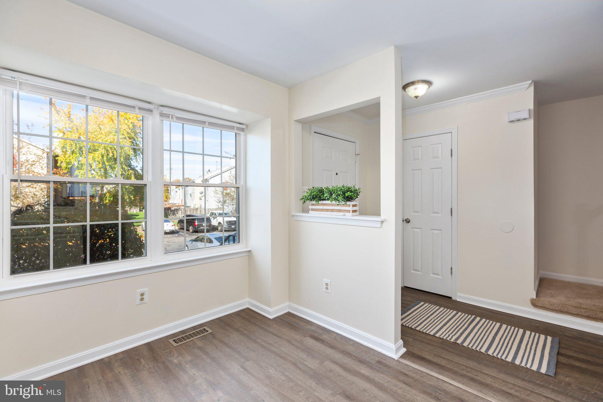17929 Milroy Drive Dumfries, VA 22026 - Photo 4 of 36 an empty room with windows