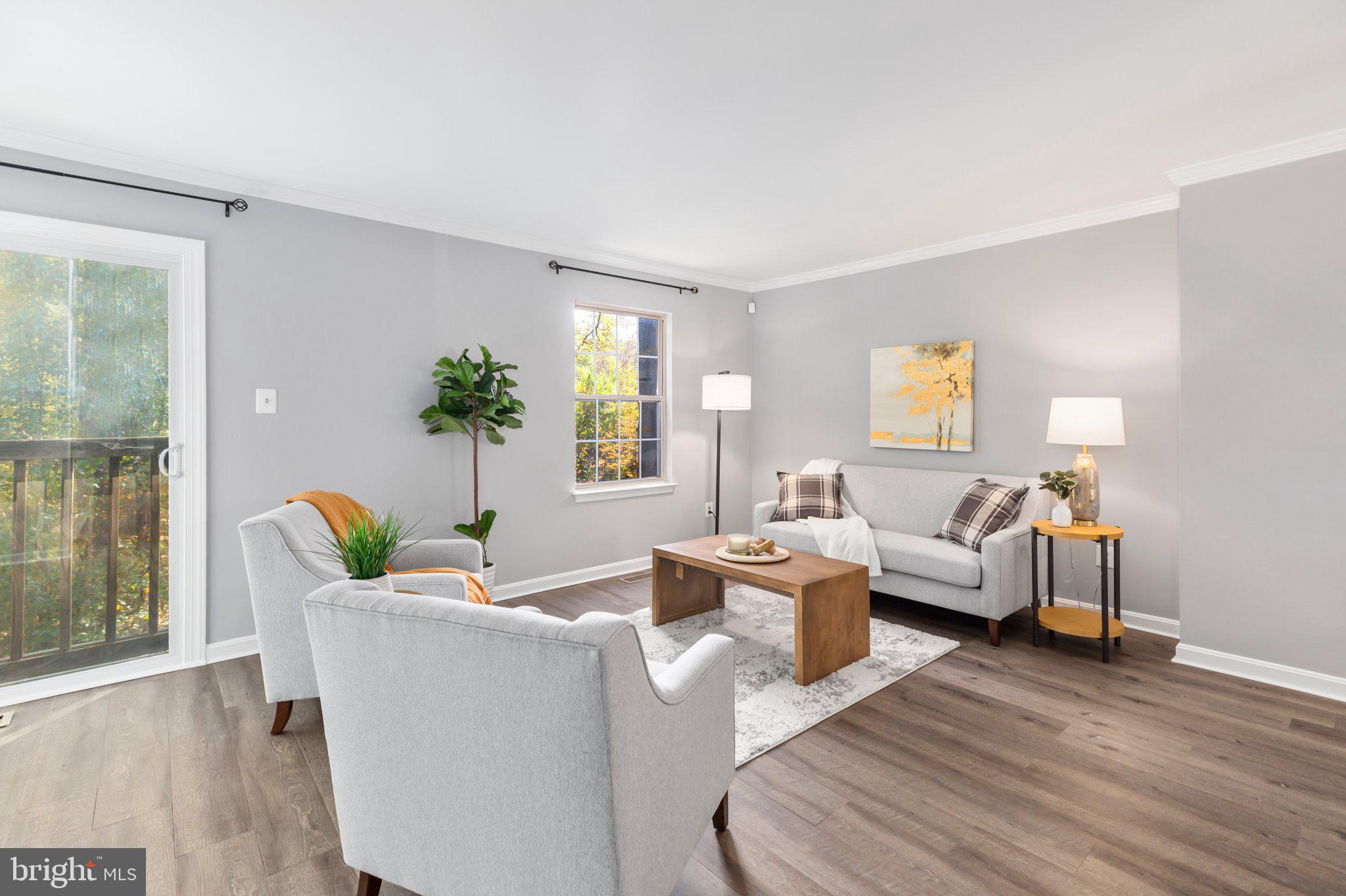17929 Milroy Drive Dumfries, VA 22026 - Photo 8 of 36 a living room with furniture and wooden floor