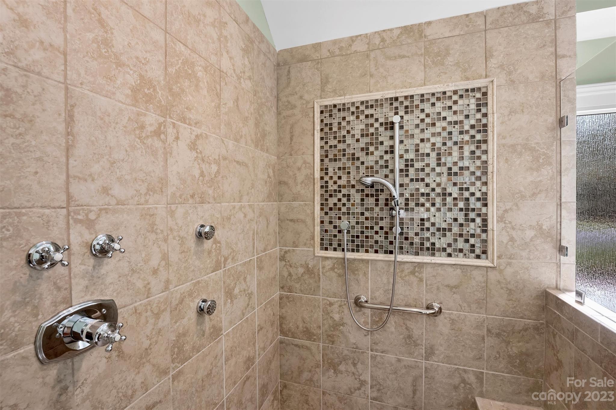 4724 Carson's Pond Road, Unit 104 Charlotte, NC 28226 - Photo 19 of 38 a bathroom with a shower