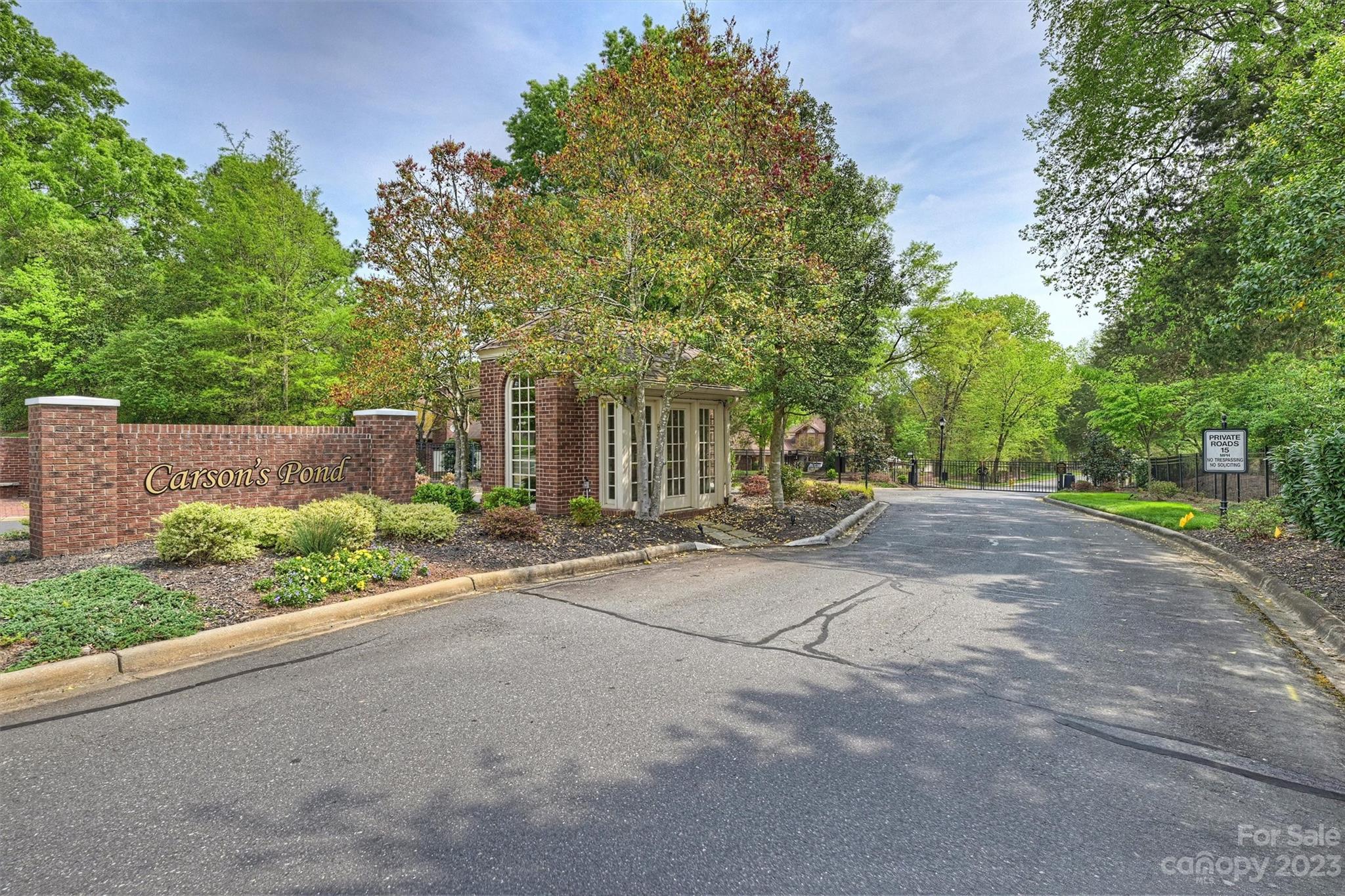 4724 Carson's Pond Road, Unit 104 Charlotte, NC 28226 - Photo 38 of 38 a couple of cars parked in front of a house
