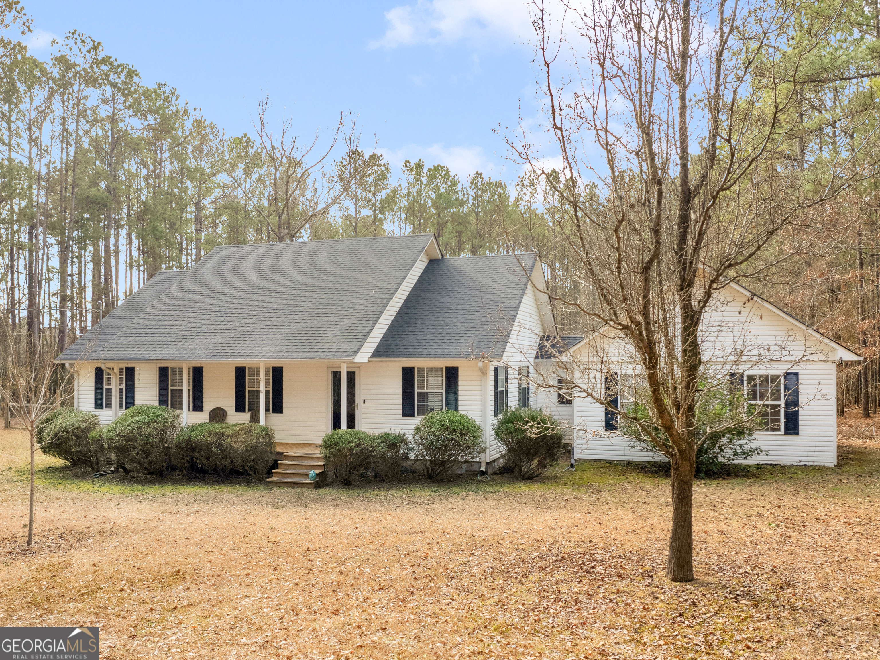 35 Loblolly Drive Zebulon, GA 30295 - Photo 1 of 1 a front view of a house with a yard and garage