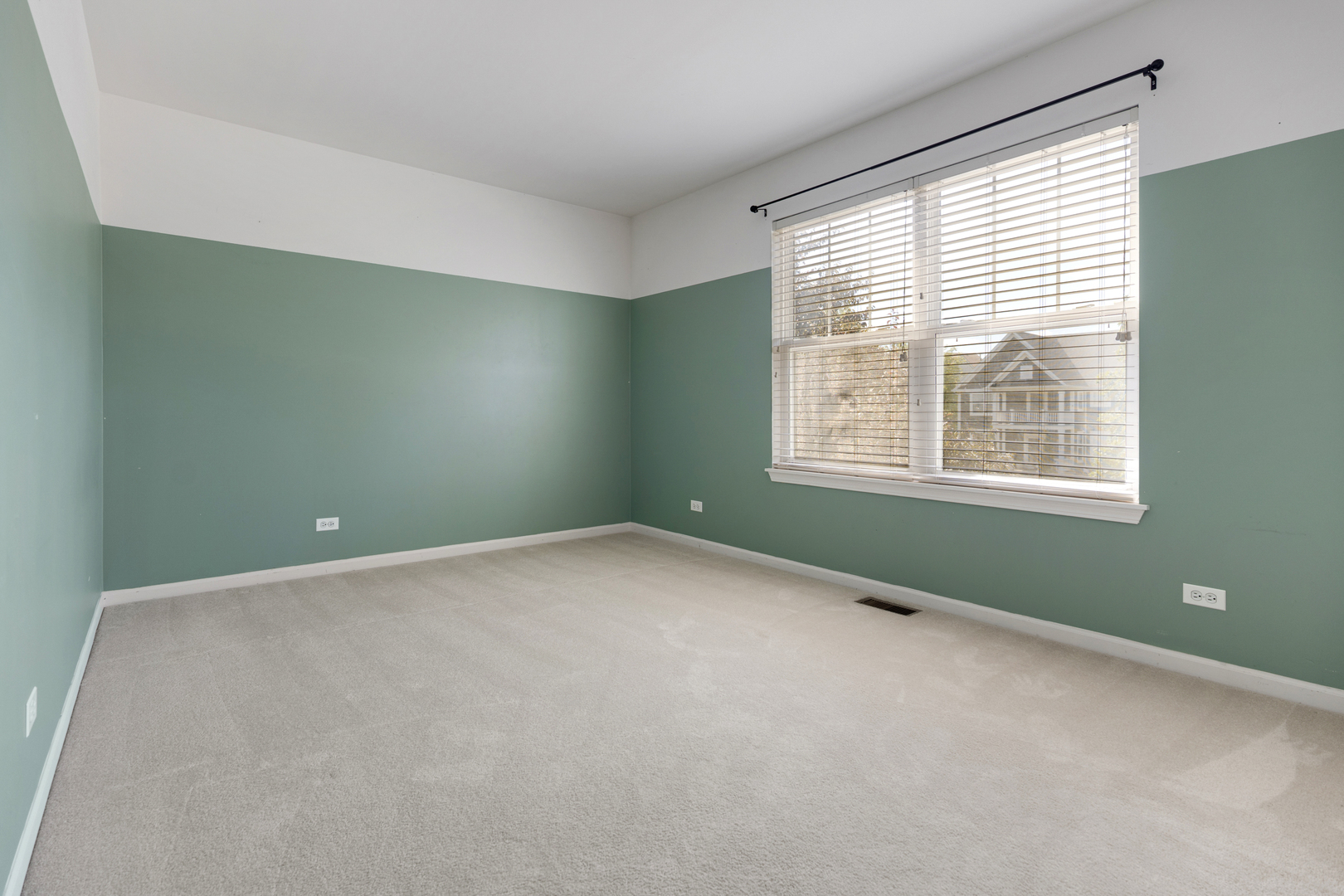 748 Hamilton Way Batavia, IL 60510 - Photo 22 of 36 a view of an empty room with a window