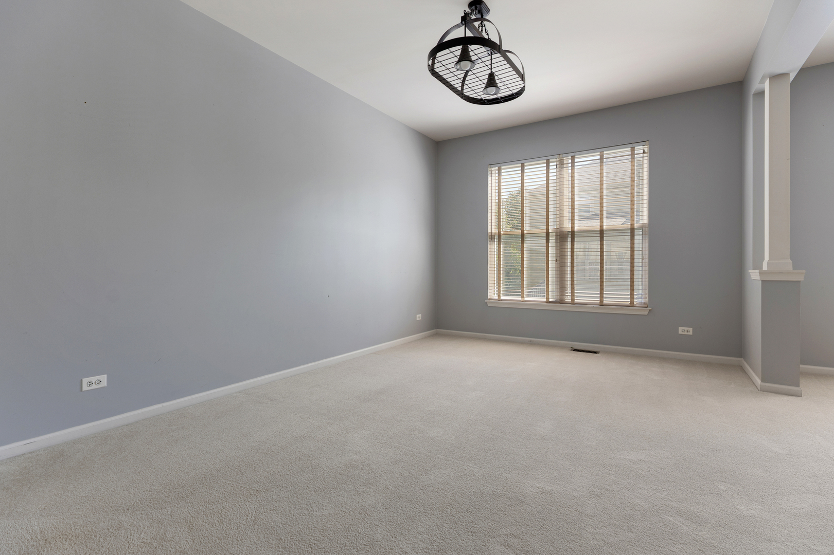 748 Hamilton Way Batavia, IL 60510 - Photo 7 of 36 a view of an empty room with a window