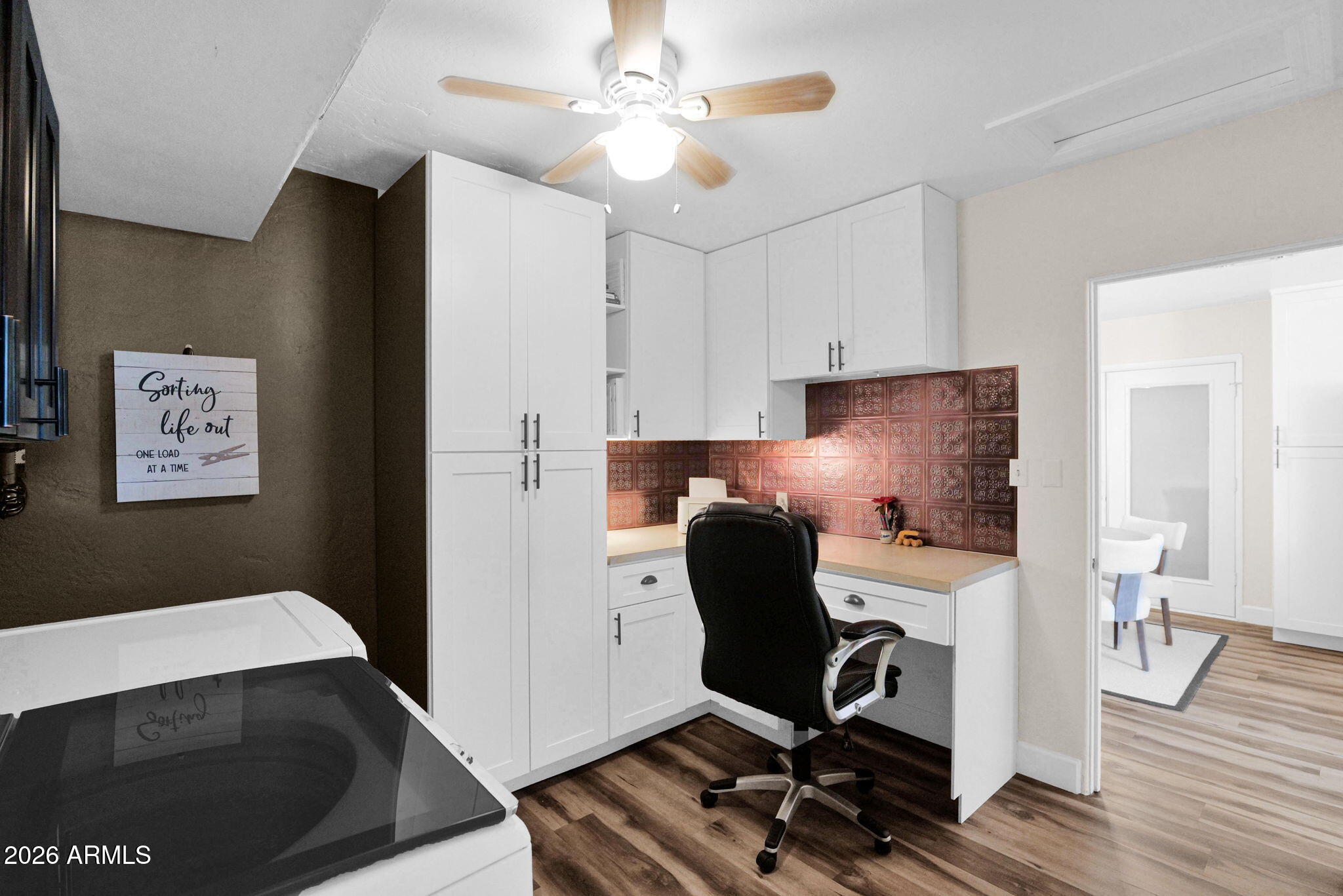 1908 East Pinchot Avenue, Unit 1908 EA Phoenix, AZ 85016 - Photo 21 of 36 a view of workspace with wooden floor lounge chair