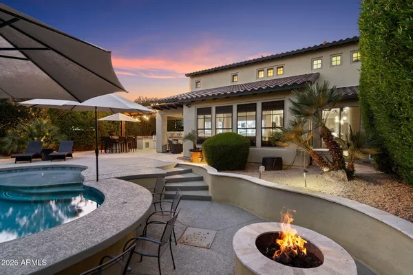 a view of a patio with swimming pool