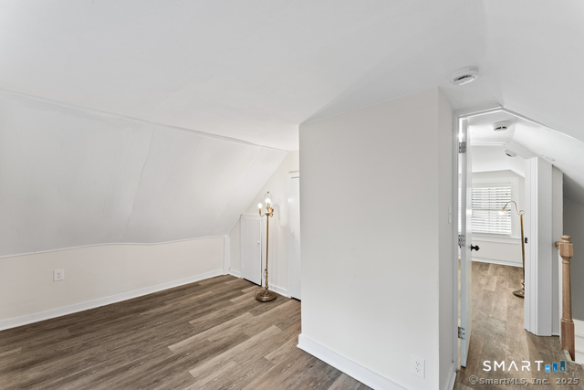 3 Riverside Road, Unit B Newtown, CT 06482 - Photo 15 of 20 a view of a livingroom with wooden floor