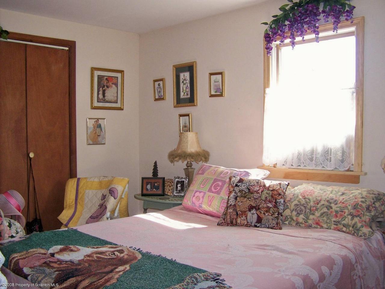 Rr#2 Rr Mehoopany, PA 18629 - Photo 13 of 17 a bedroom with a bed and a window