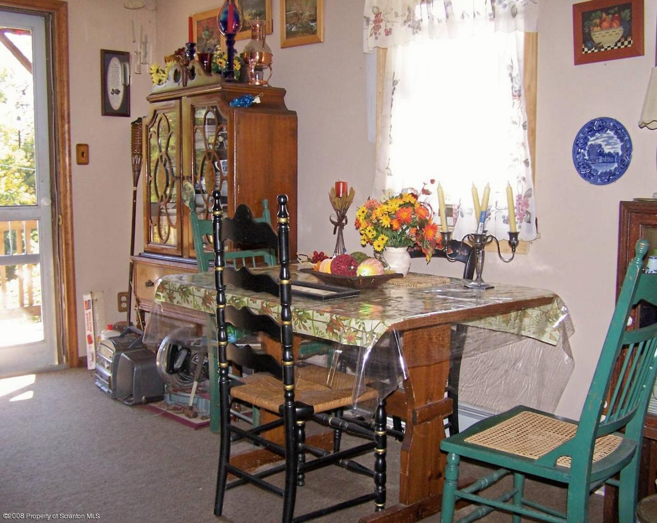 Rr#2 Rr Mehoopany, PA 18629 - Photo 14 of 17 a view of a dining room with furniture and chandelier