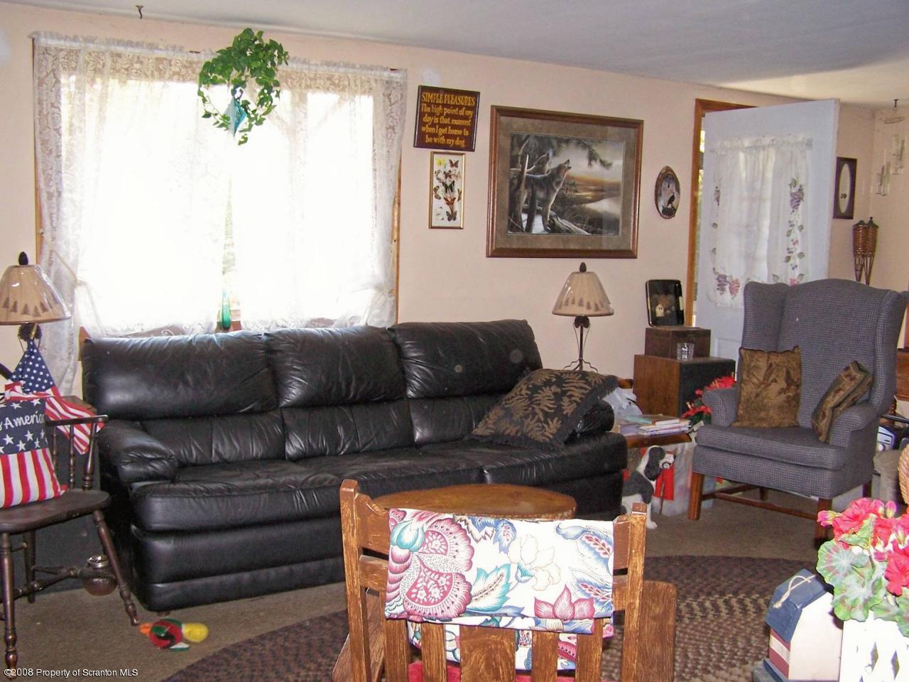 Rr#2 Rr Mehoopany, PA 18629 - Photo 10 of 17 a living room with furniture and a window