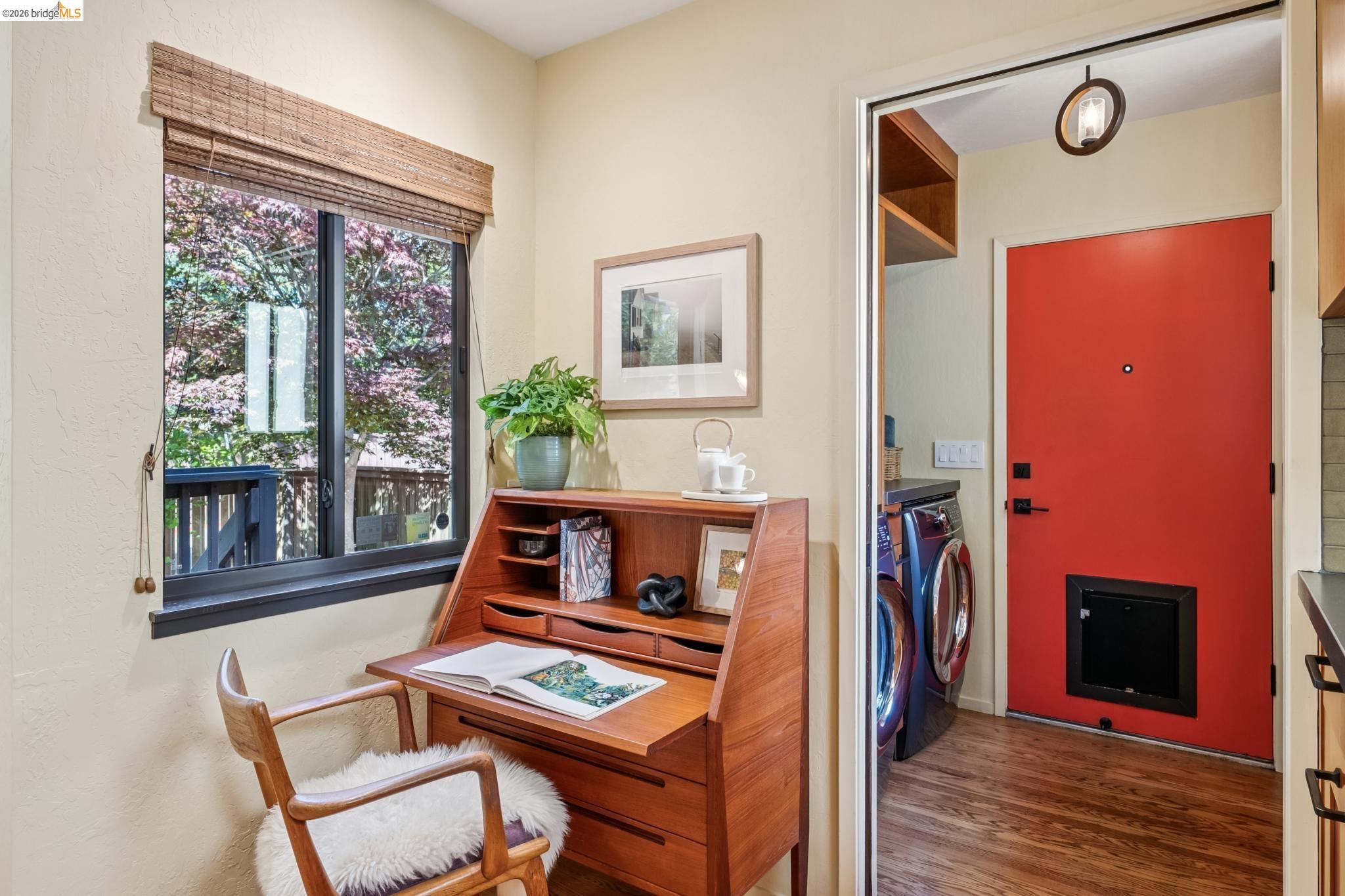 576 Vistamont Avenue Berkeley, CA 94708 - Photo 9 of 33 Home office nook featuring a built-in wood desk and a window with woven wood blinds