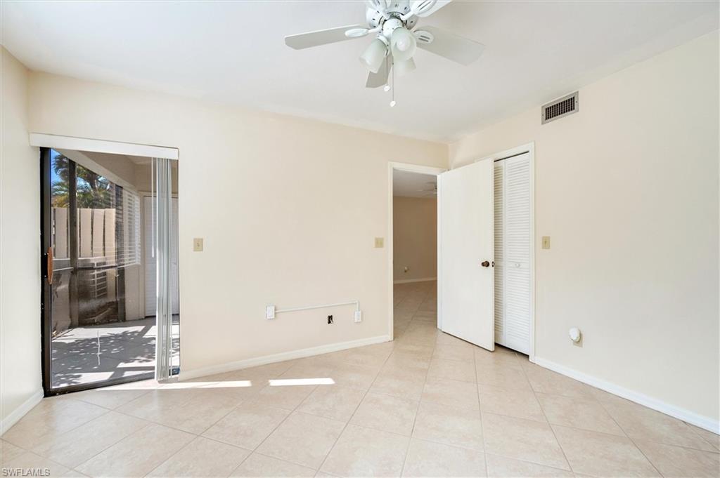 5825 Rattlesnake Hammock Road, Unit 107 Naples, FL 34113 - Photo 17 of 38 a view of an empty room with a bathroom