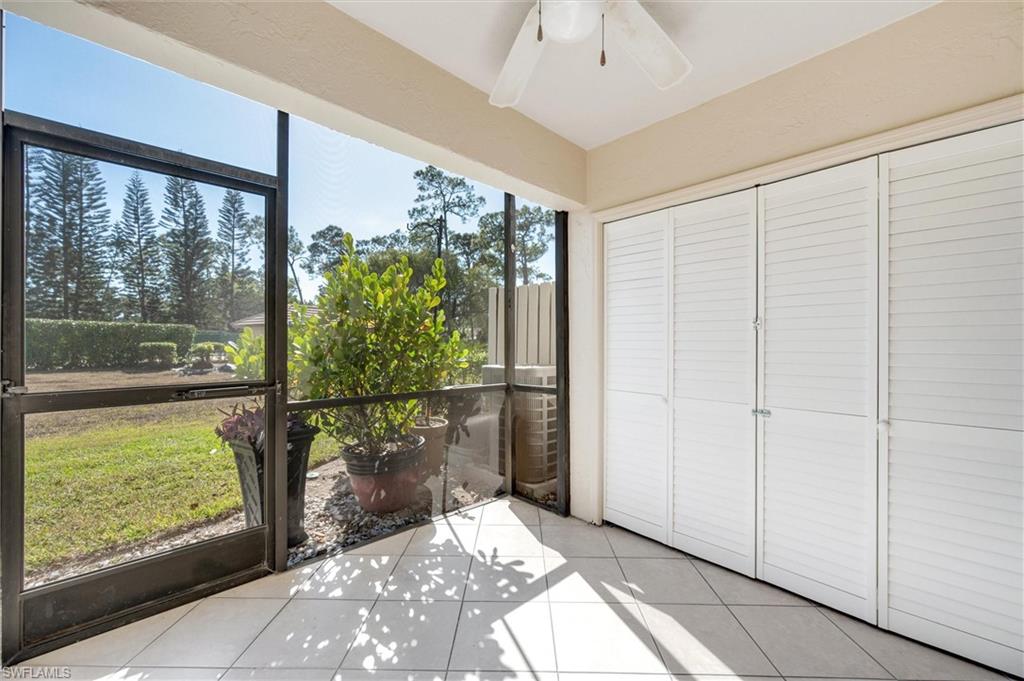 5825 Rattlesnake Hammock Road, Unit 107 Naples, FL 34113 - Photo 26 of 38 a view of a glass door and an entryway
