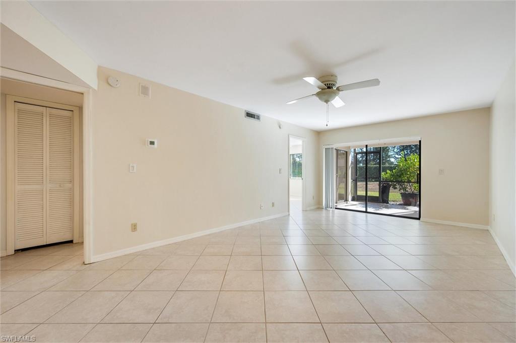 5825 Rattlesnake Hammock Road, Unit 107 Naples, FL 34113 - Photo 6 of 38 a view of an empty room with a window