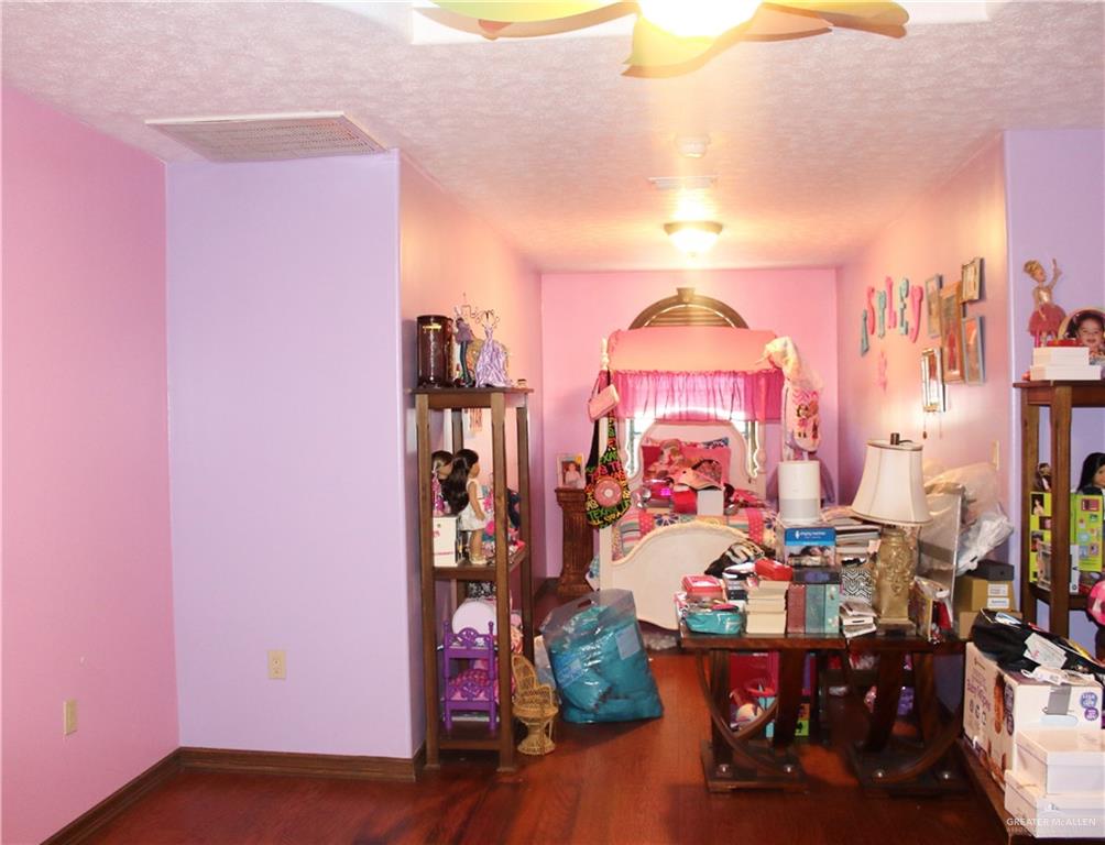 322 North Charco Blanco Road Rio Grande City, TX 78582 - Photo 21 of 28 a view of a room with gym equipment