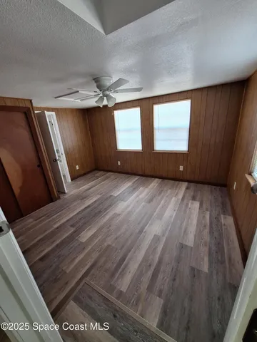 a view of wooden floor and staircase