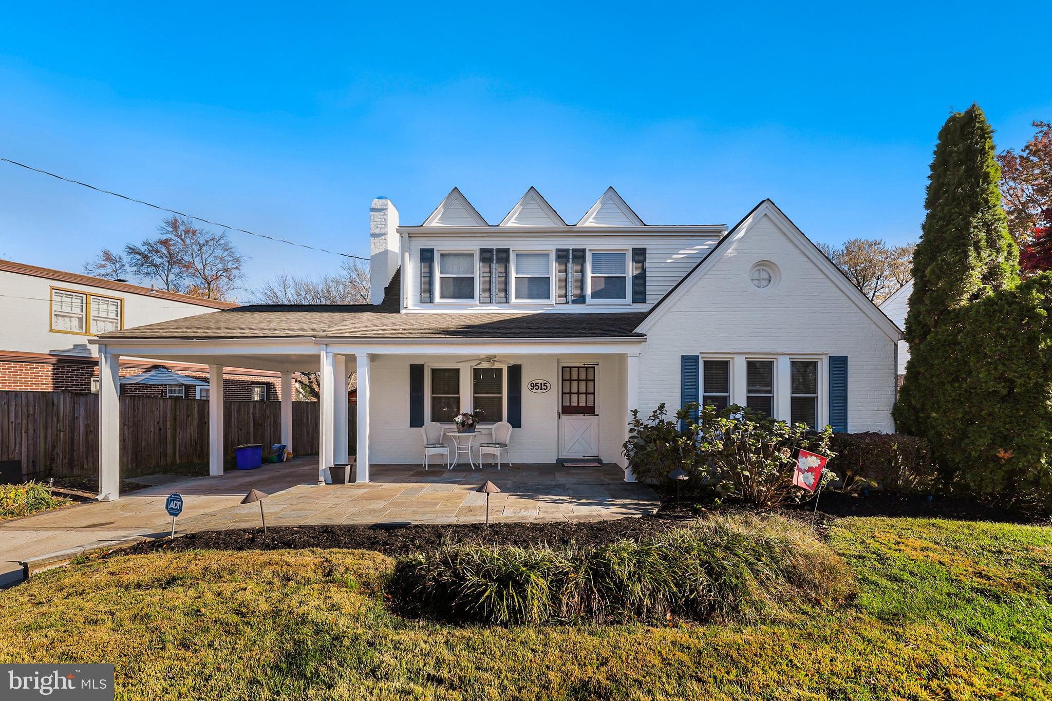 9515 Riley Road Silver Spring, MD 20910 - Photo 1 of 43 a front view of a house with garden