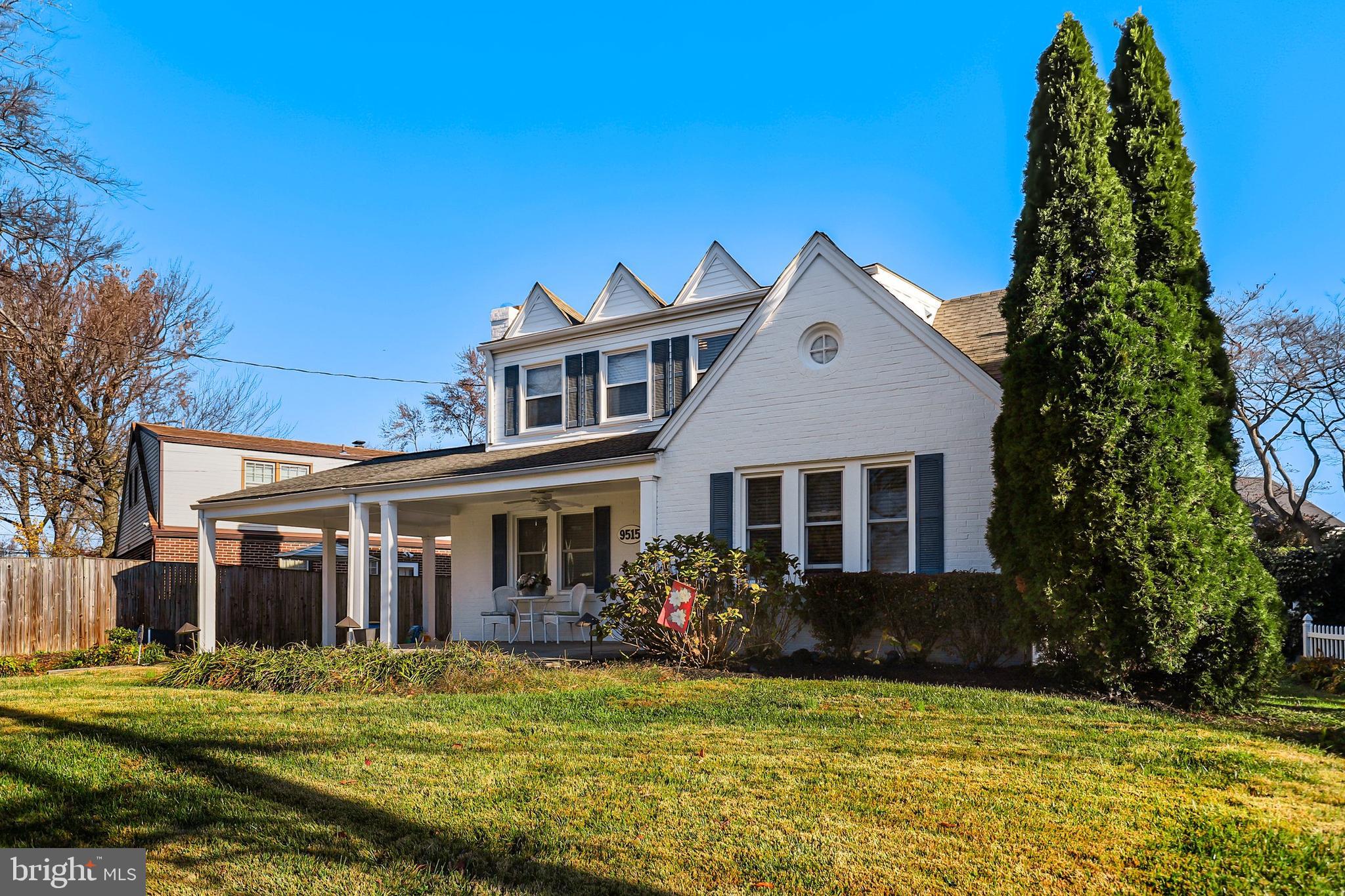 9515 Riley Road Silver Spring, MD 20910 - Photo 2 of 43 a front view of a house with a yard
