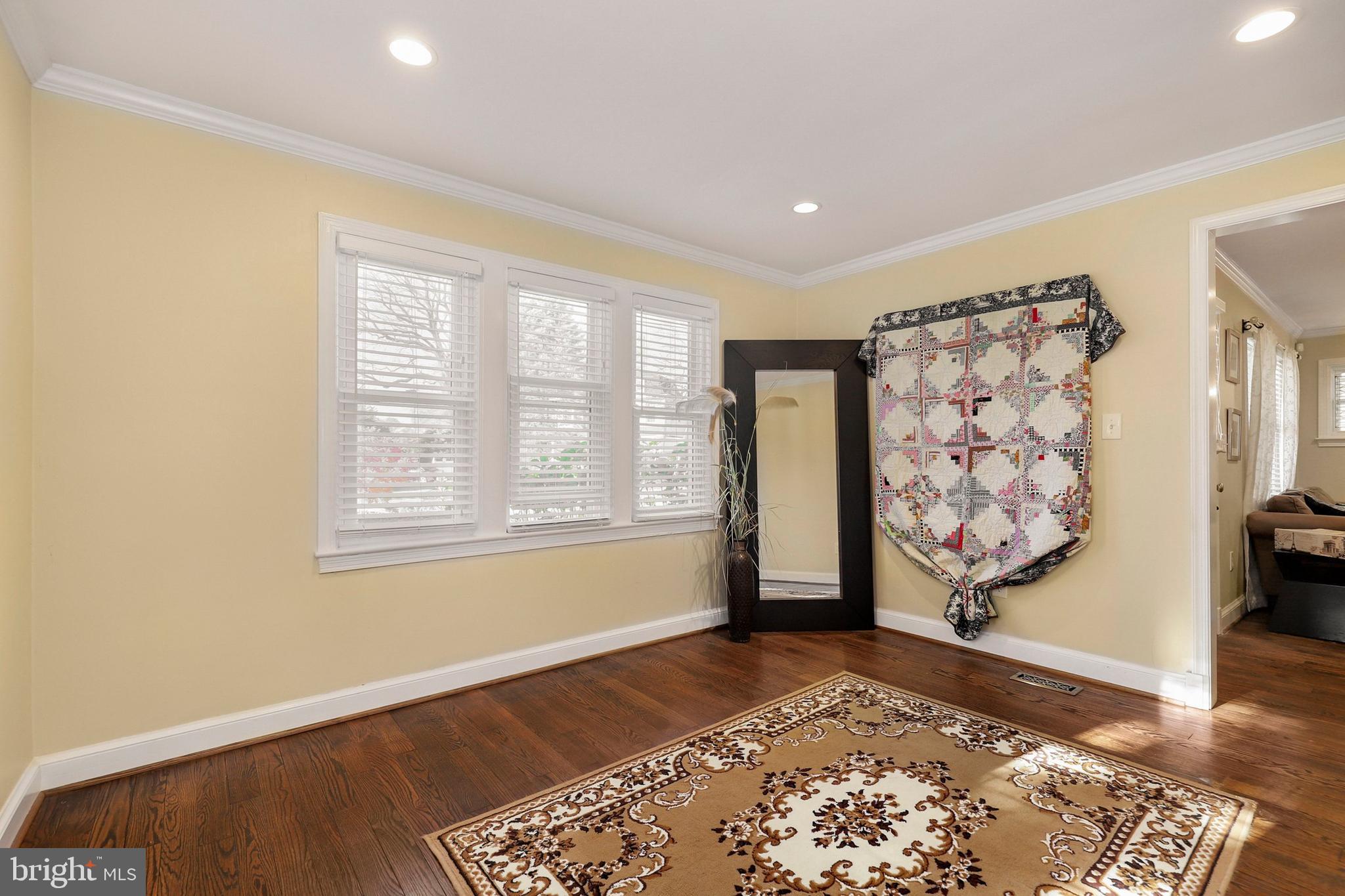 9515 Riley Road Silver Spring, MD 20910 - Photo 18 of 43 a view of a room with window and wooden floor