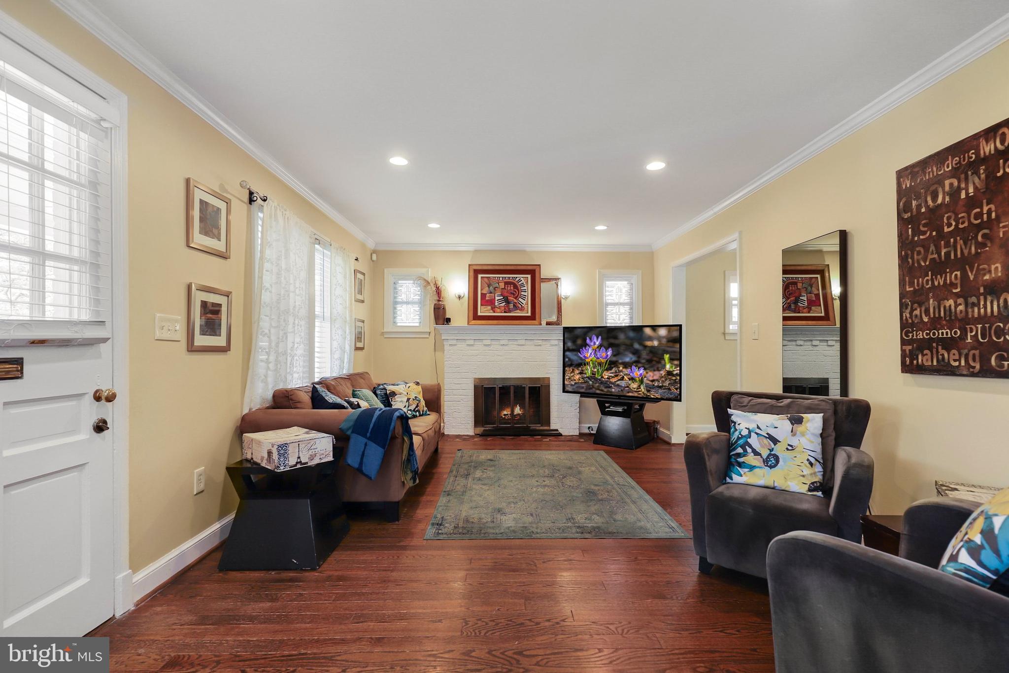 9515 Riley Road Silver Spring, MD 20910 - Photo 4 of 43 a living room with furniture and a fireplace