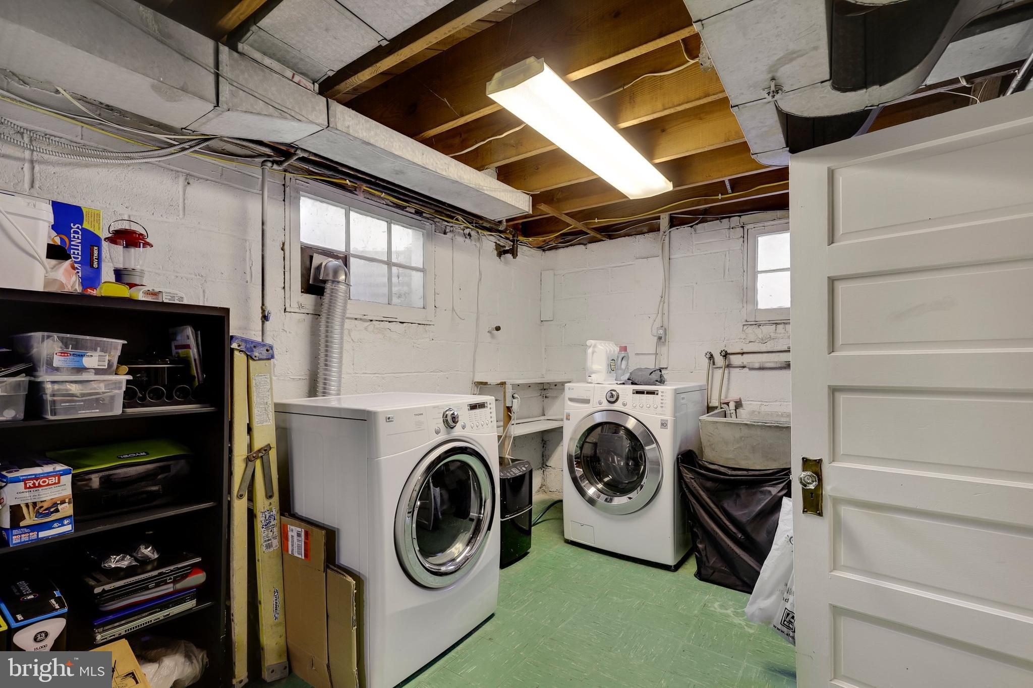 9515 Riley Road Silver Spring, MD 20910 - Photo 38 of 43 a utility room with dryer and washer
