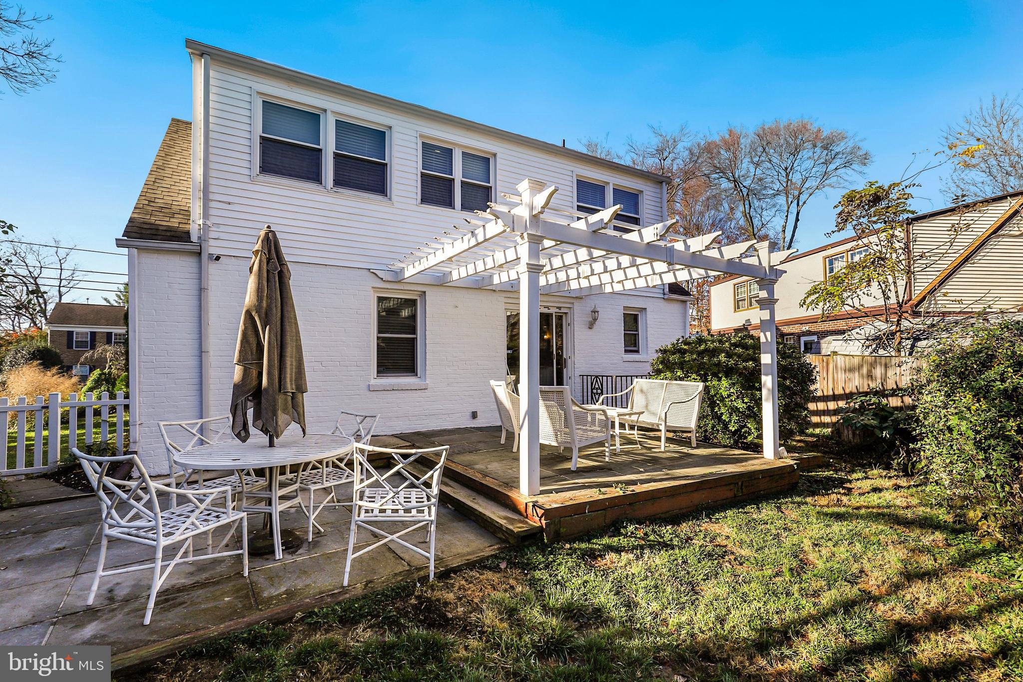 9515 Riley Road Silver Spring, MD 20910 - Photo 42 of 43 a view of a house with backyard and sitting area