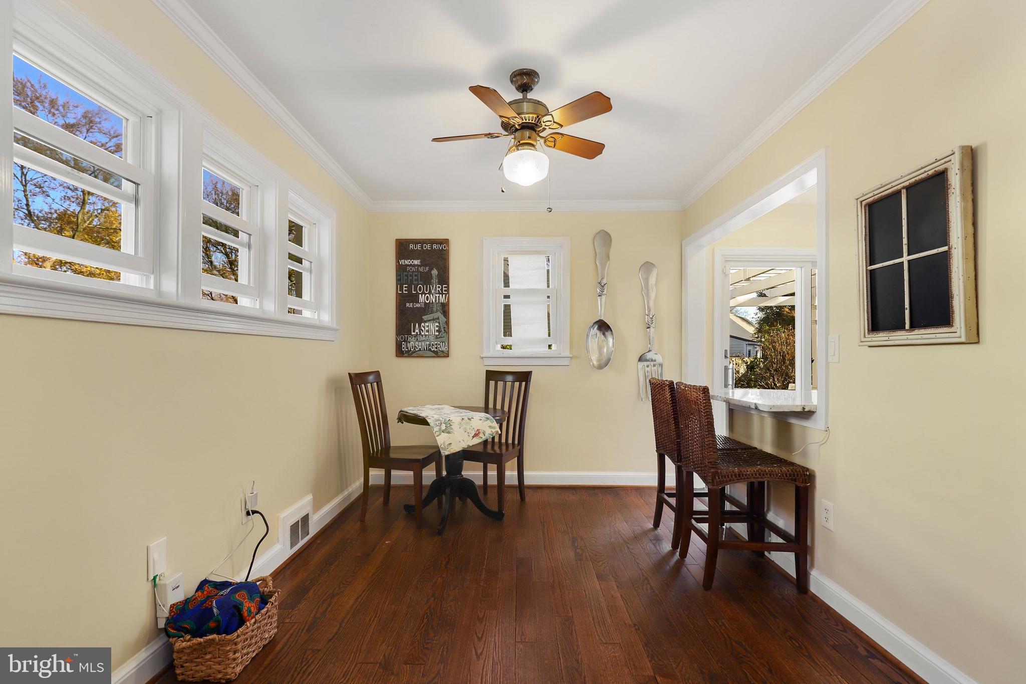 9515 Riley Road Silver Spring, MD 20910 - Photo 9 of 43 a view of a livingroom with furniture and entryway wooden floor