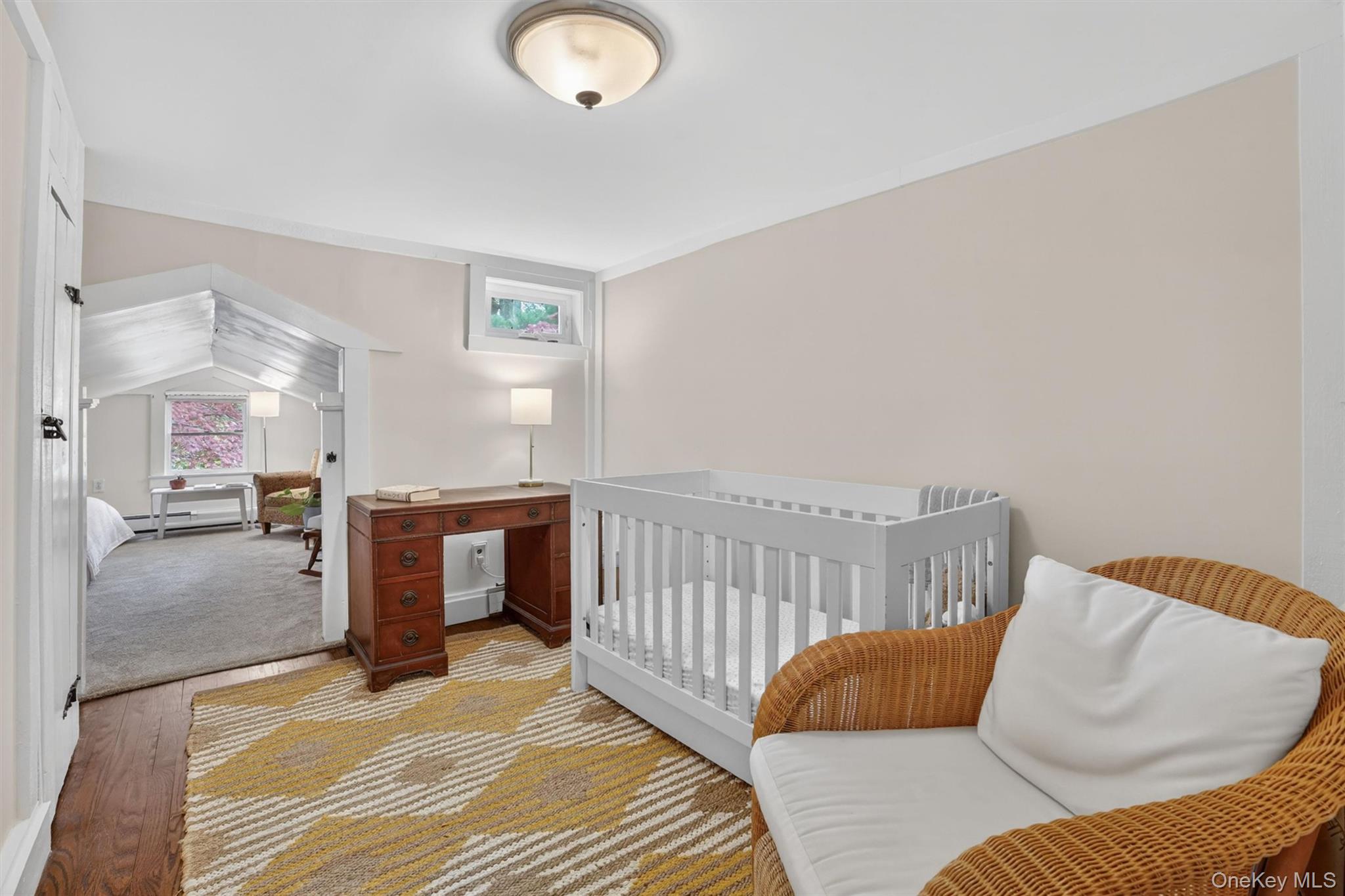 9 Sloehidden Road Briarcliff Manor, NY 10510 - Photo 30 of 49 sitting room being with a crib and bedroom beyond