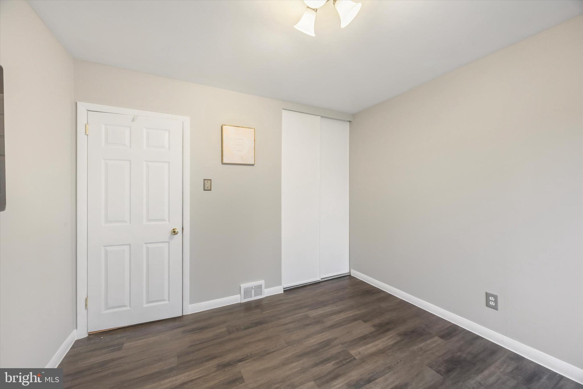 213 Hoffman Road Ridley Park, PA 19078 - Photo 12 of 29 a view of an empty room with wooden floor