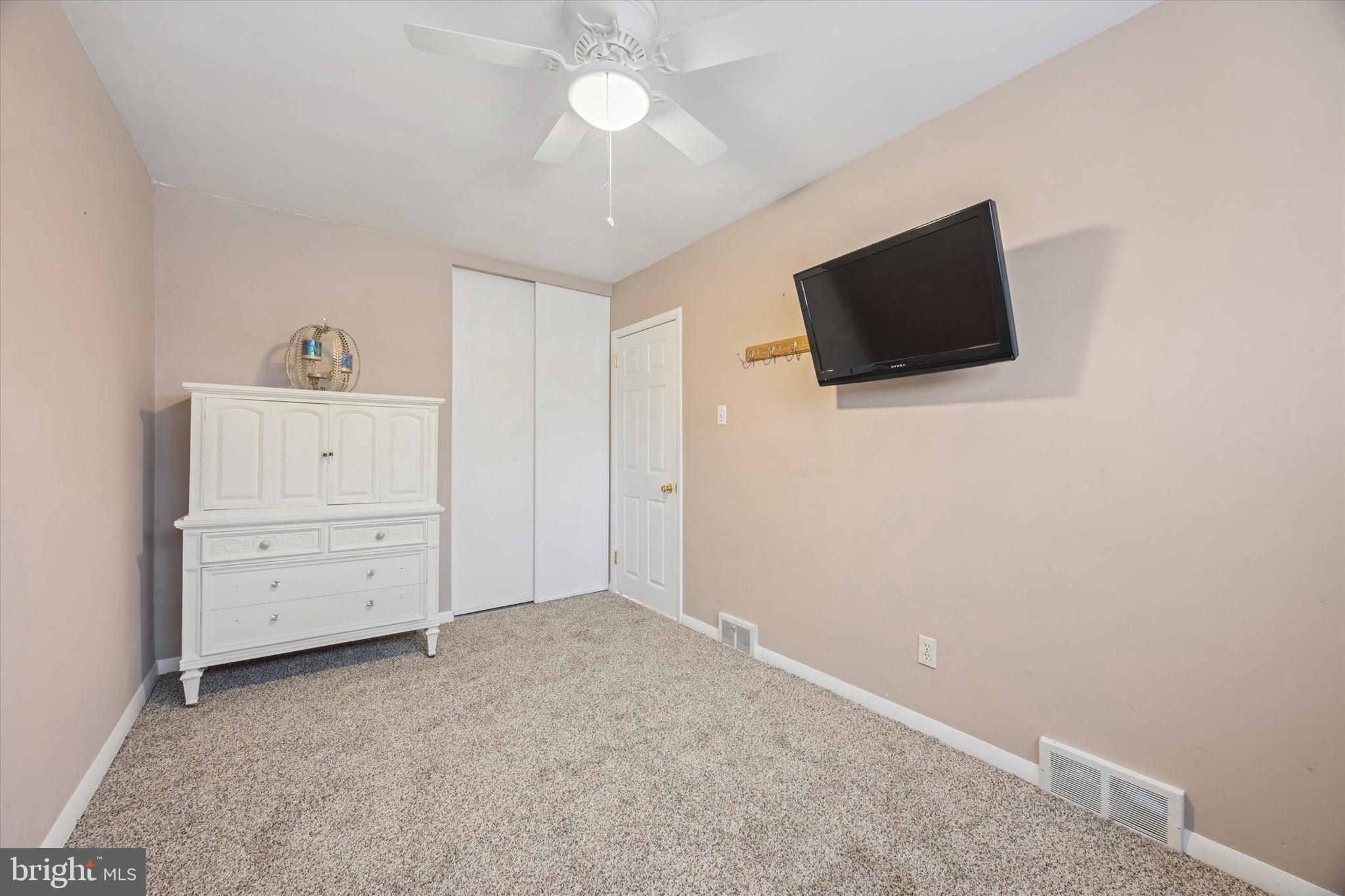 213 Hoffman Road Ridley Park, PA 19078 - Photo 14 of 29 a view of a livingroom with furniture and a flat screen tv