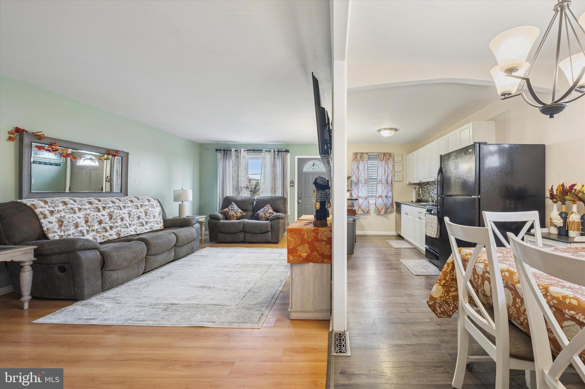 213 Hoffman Road Ridley Park, PA 19078 - Photo 29 of 29 a living room with furniture and a flat screen tv