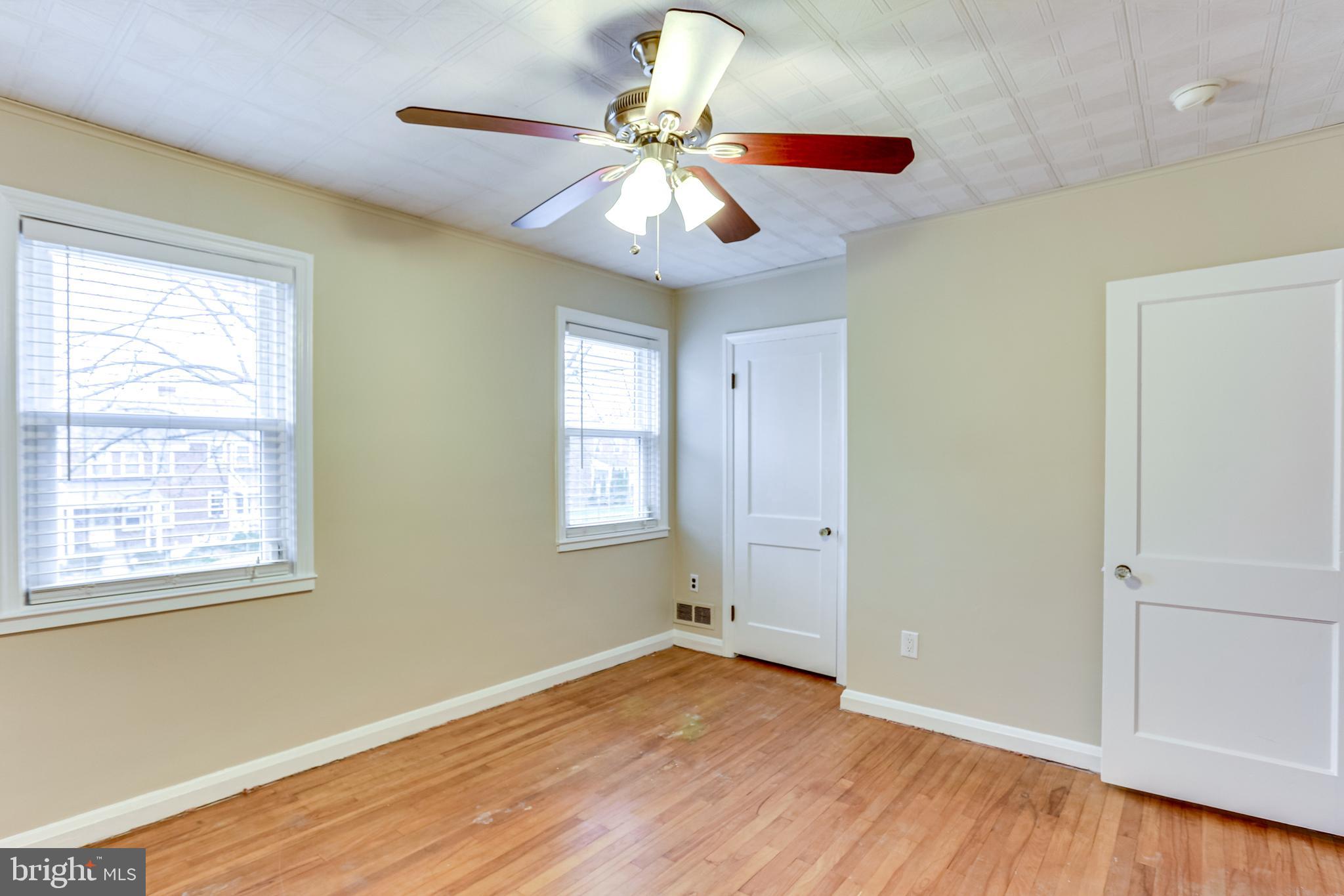 8301 Ridgely Oak Road Baltimore, MD 21234 - Photo 15 of 25 His and Hers closets in primary bedroom