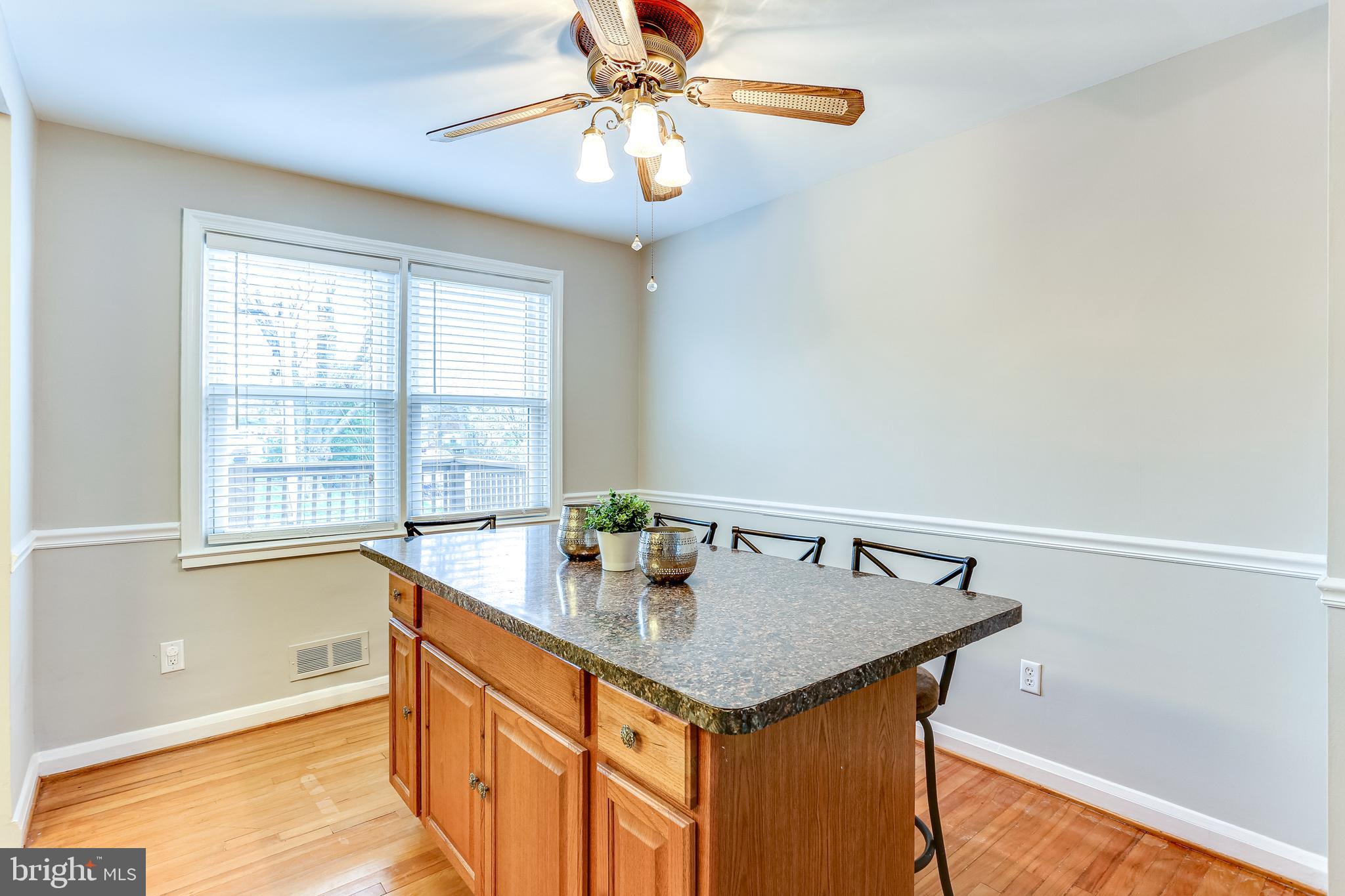 8301 Ridgely Oak Road Baltimore, MD 21234 - Photo 9 of 25 Large island for family meals and storage