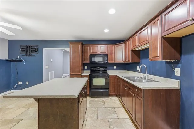 a view of backyard with outdoor seating