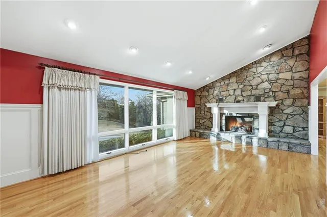 a view of an room with a large window