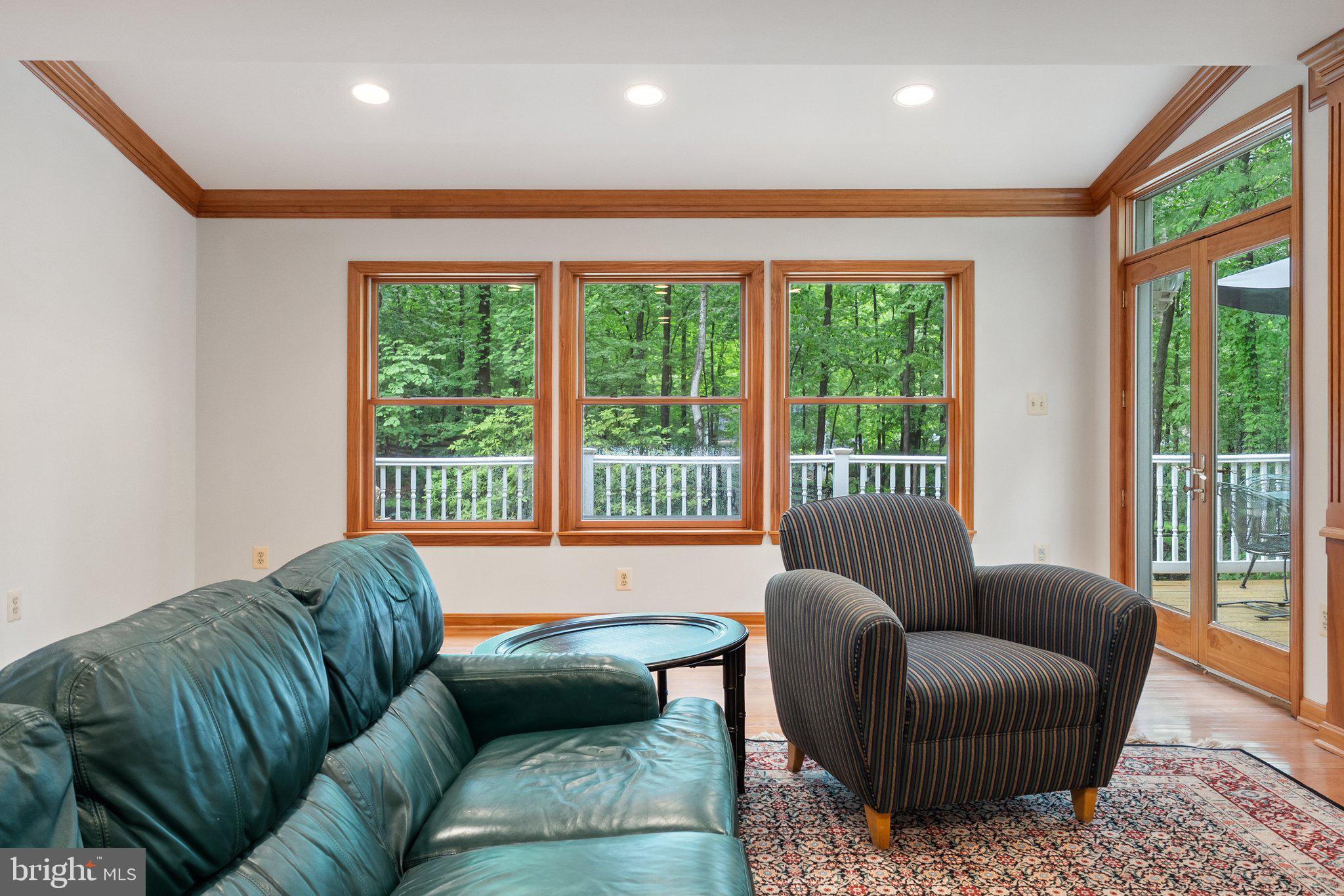 11100 Burywood Lane Reston, VA 20194 - Photo 14 of 42 a living room with furniture and a large window