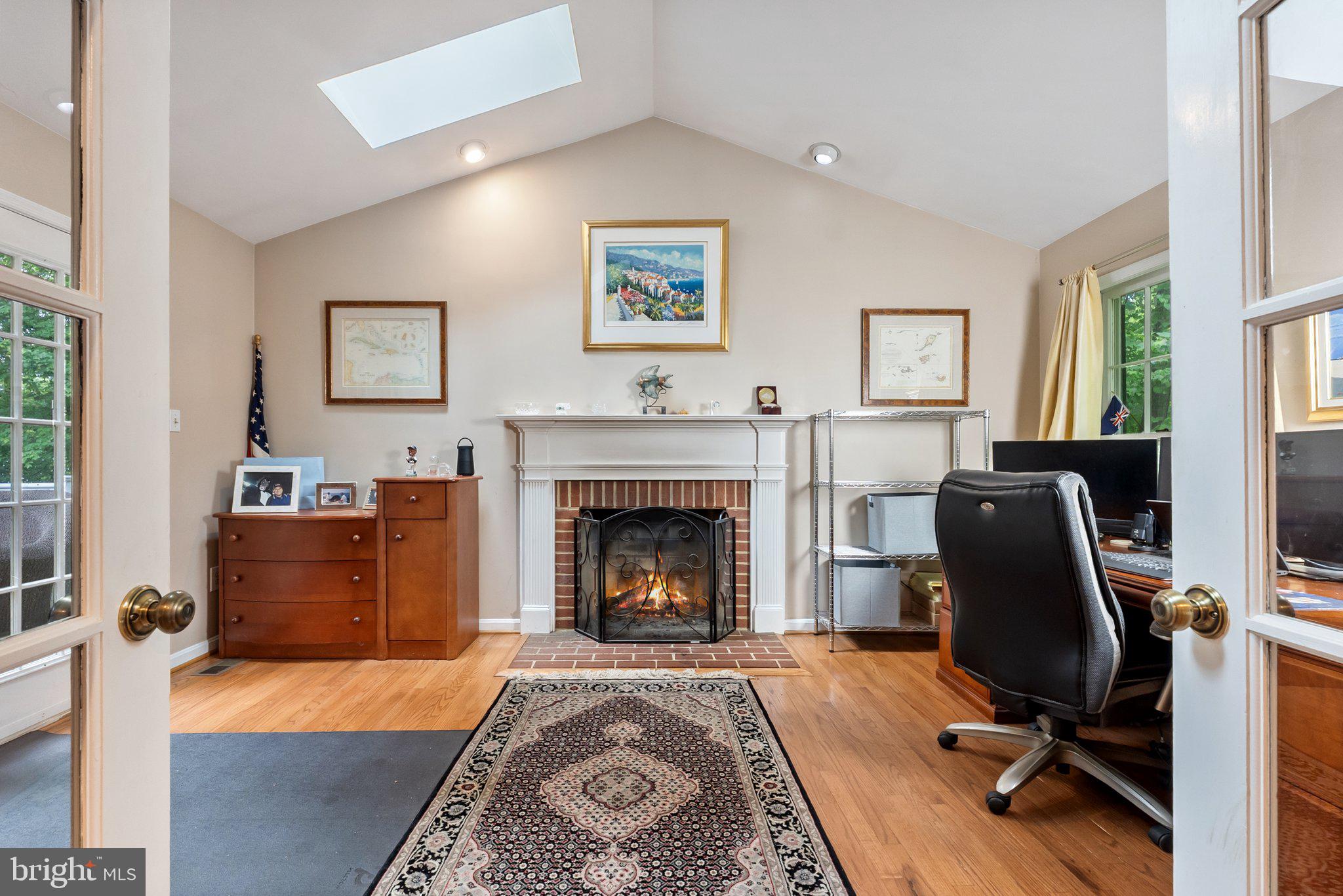 11100 Burywood Lane Reston, VA 20194 - Photo 16 of 42 a living room with furniture and a fireplace