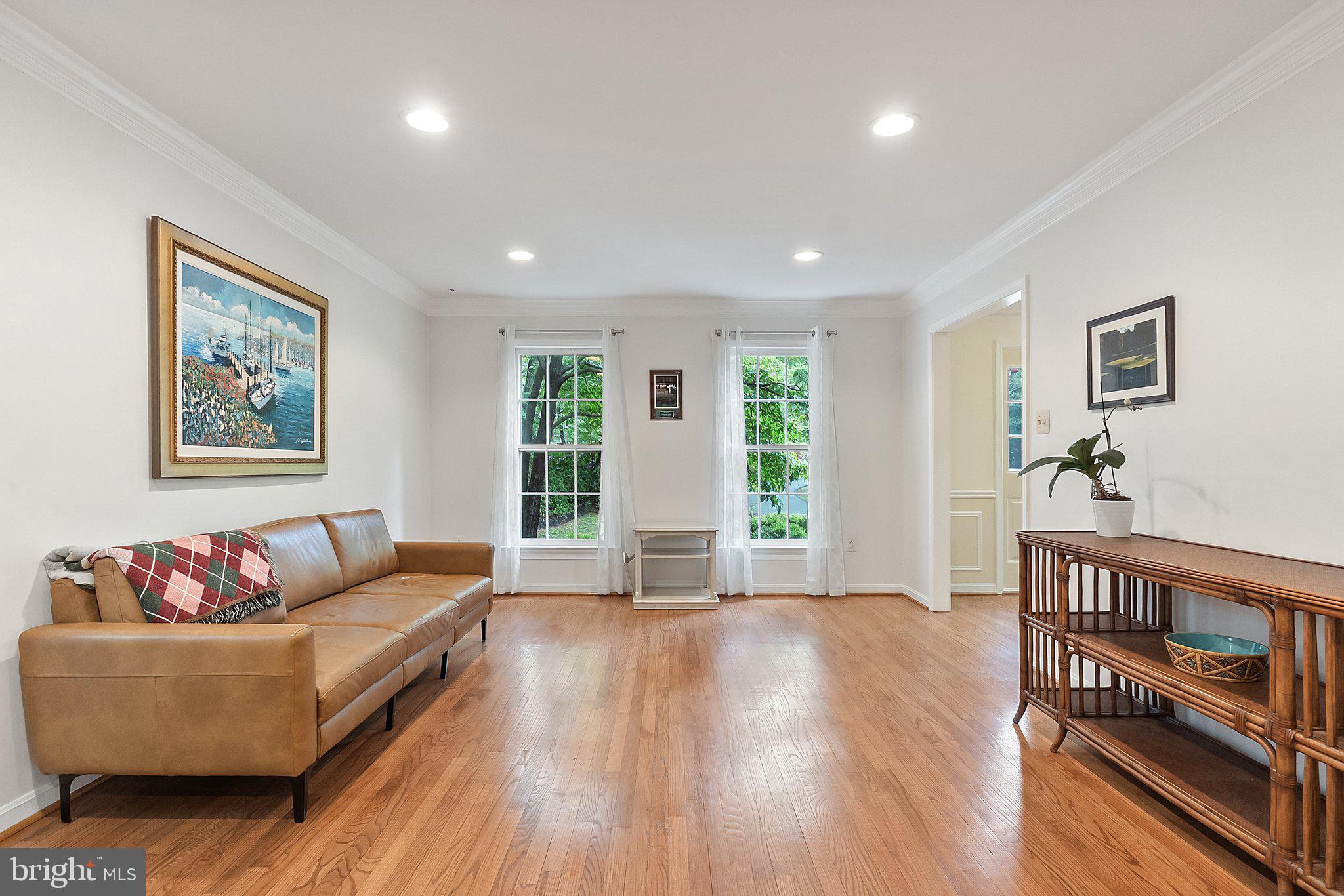 11100 Burywood Lane Reston, VA 20194 - Photo 17 of 42 a living room with furniture and a wooden floor