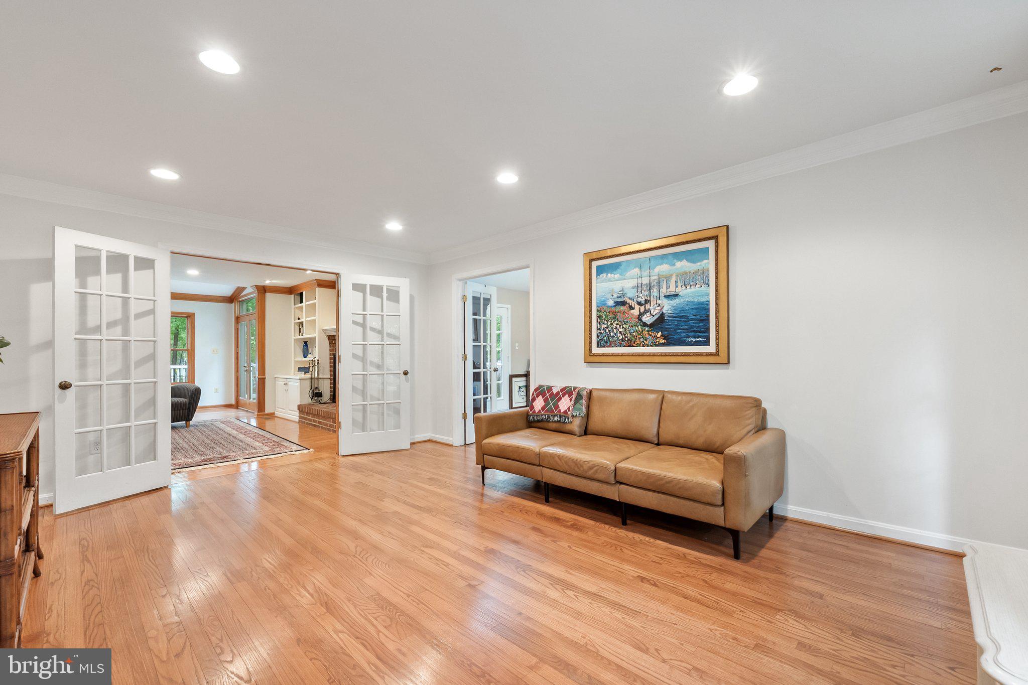 11100 Burywood Lane Reston, VA 20194 - Photo 18 of 42 a living room with furniture and a large window