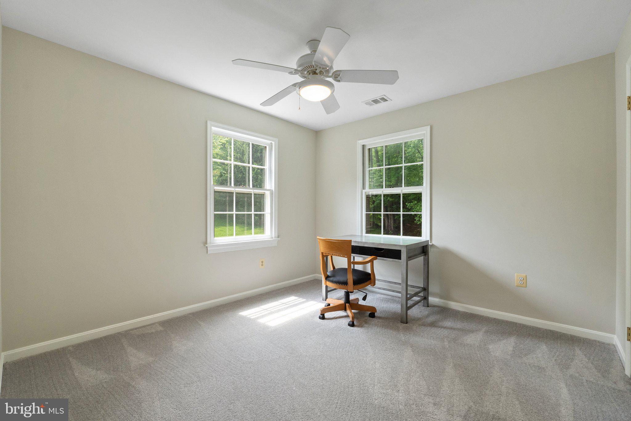 11100 Burywood Lane Reston, VA 20194 - Photo 28 of 42 a view of a workspace with furniture and a window