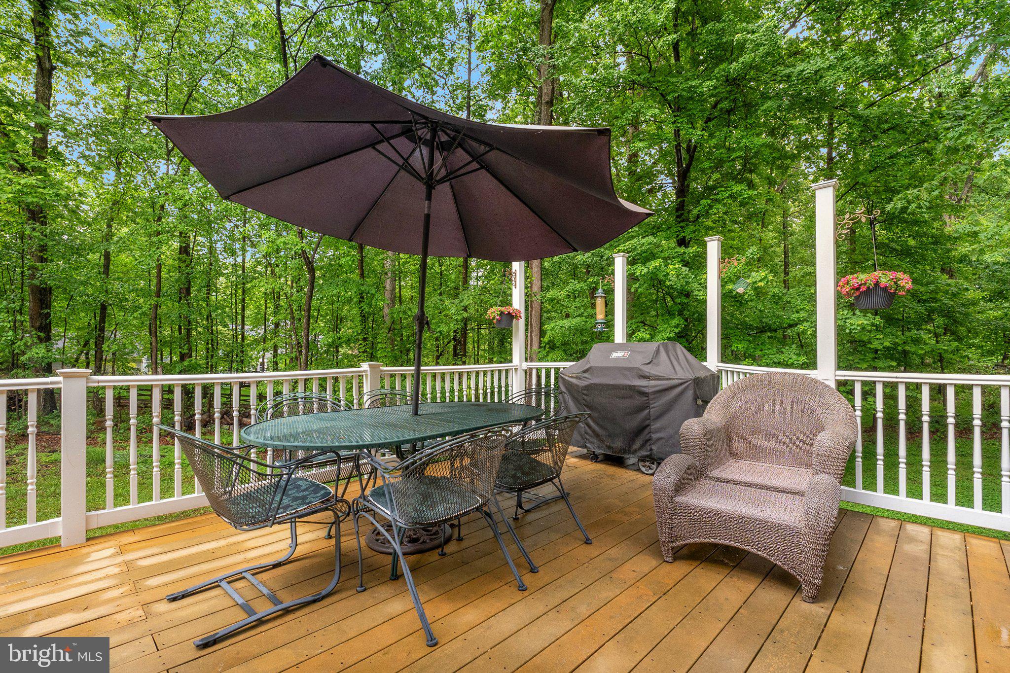 11100 Burywood Lane Reston, VA 20194 - Photo 36 of 42 a view of a deck with furniture and wooden deck