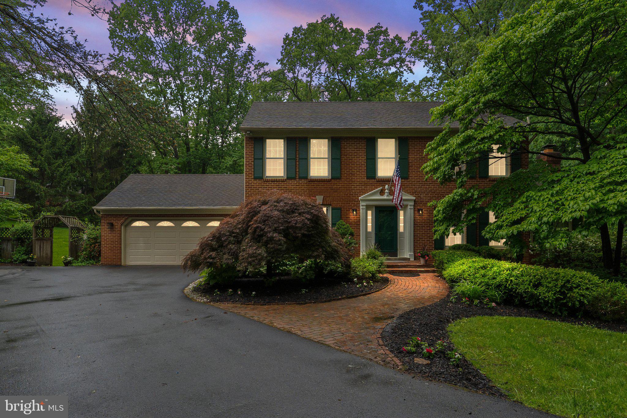 11100 Burywood Lane Reston, VA 20194 - Photo 42 of 42 front view of a house with a yard